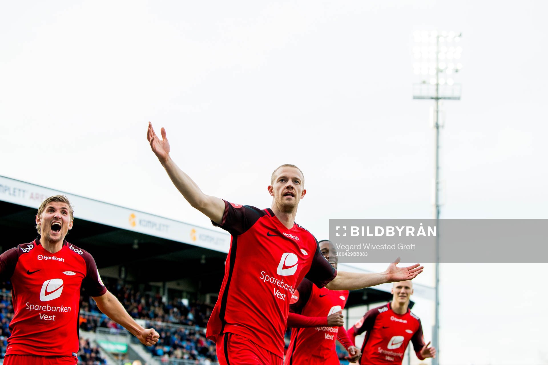 Peter Orry Larsen of Brann celebrates with teammates