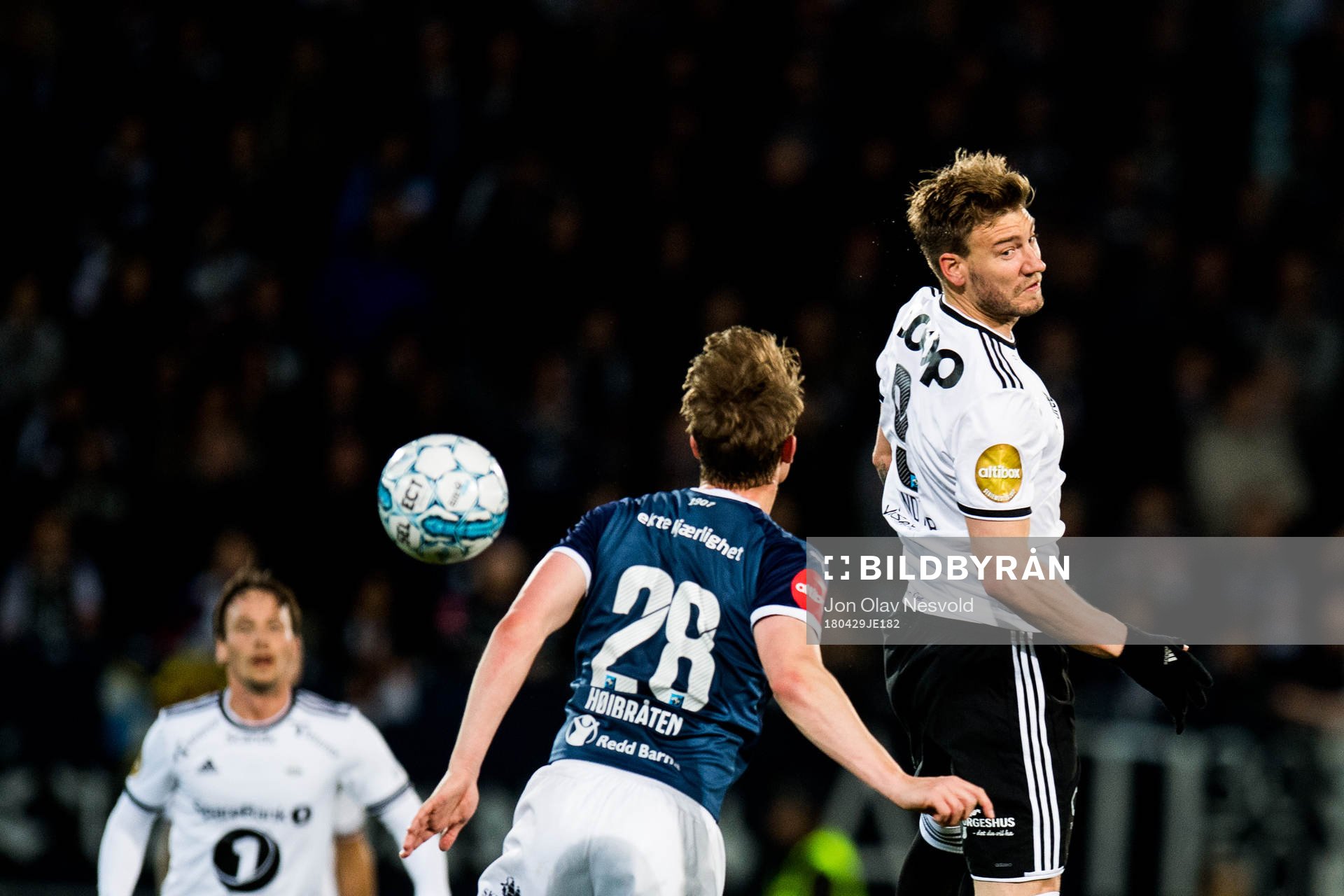 Marius Høibråten of Strømsgodset and Nicklas Bendtner of