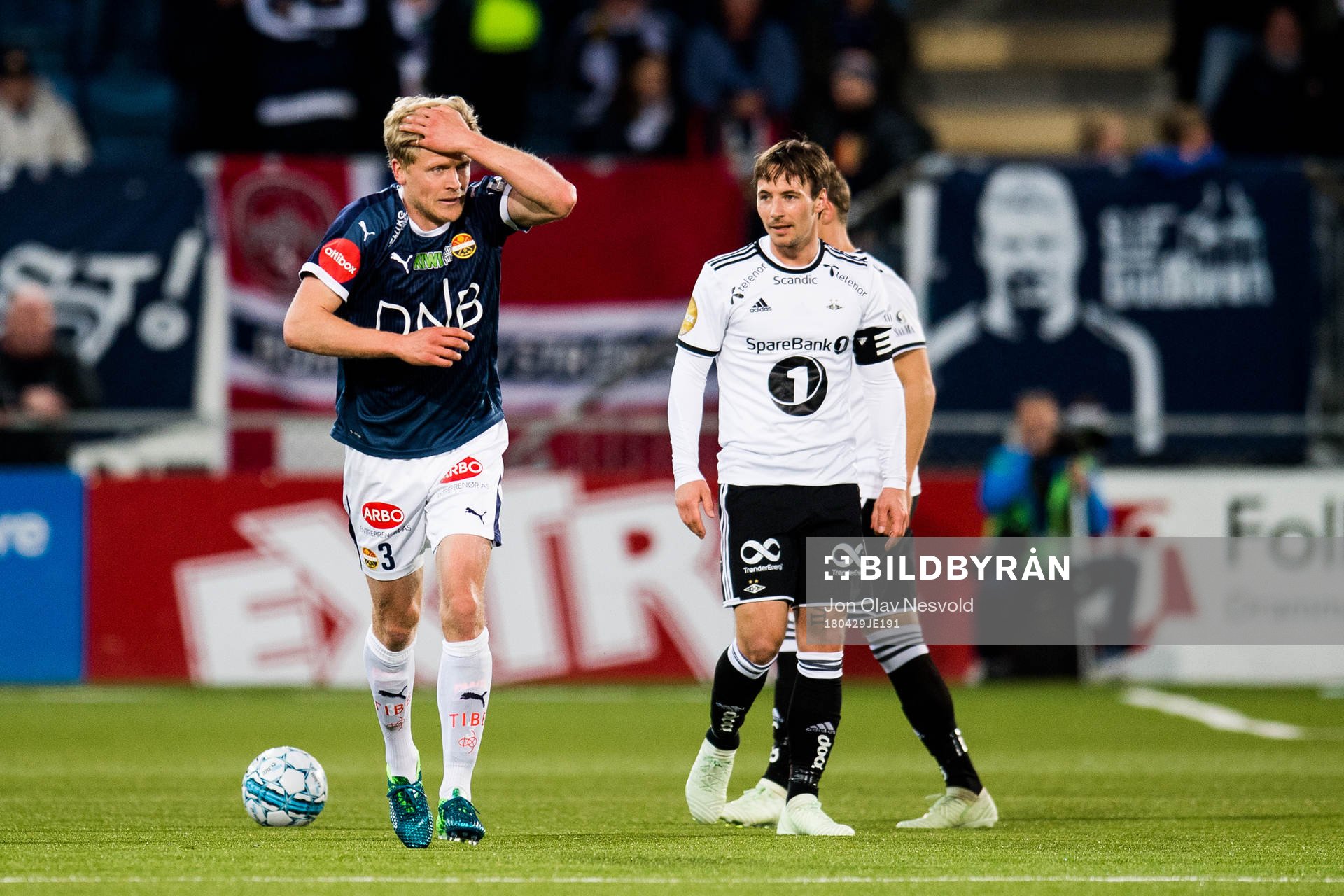 Jonathan Parr of Strømsgodset and Mike Jensen of Rosenborg