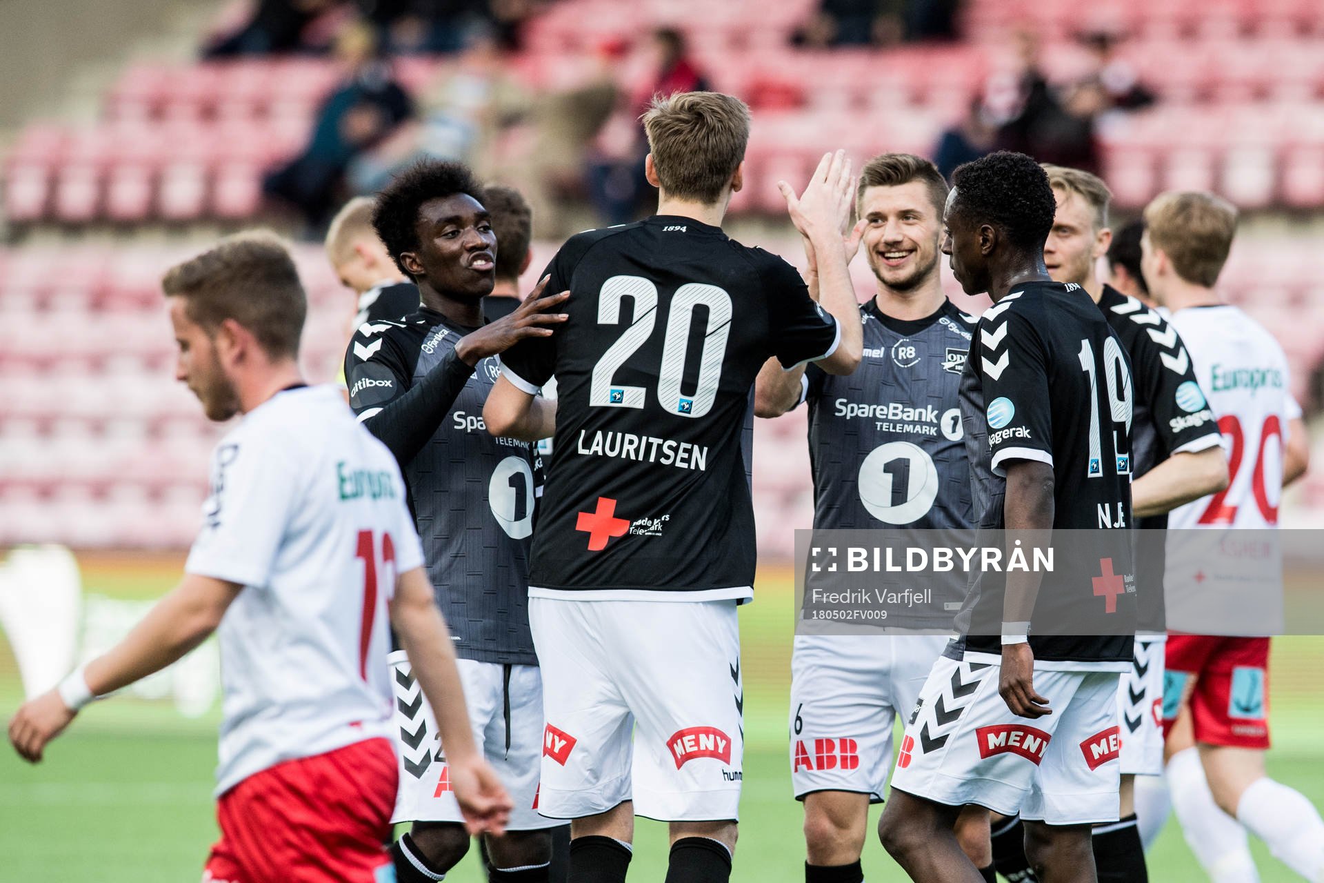 Tobias Lauritsen of Odd celebrates with teammates