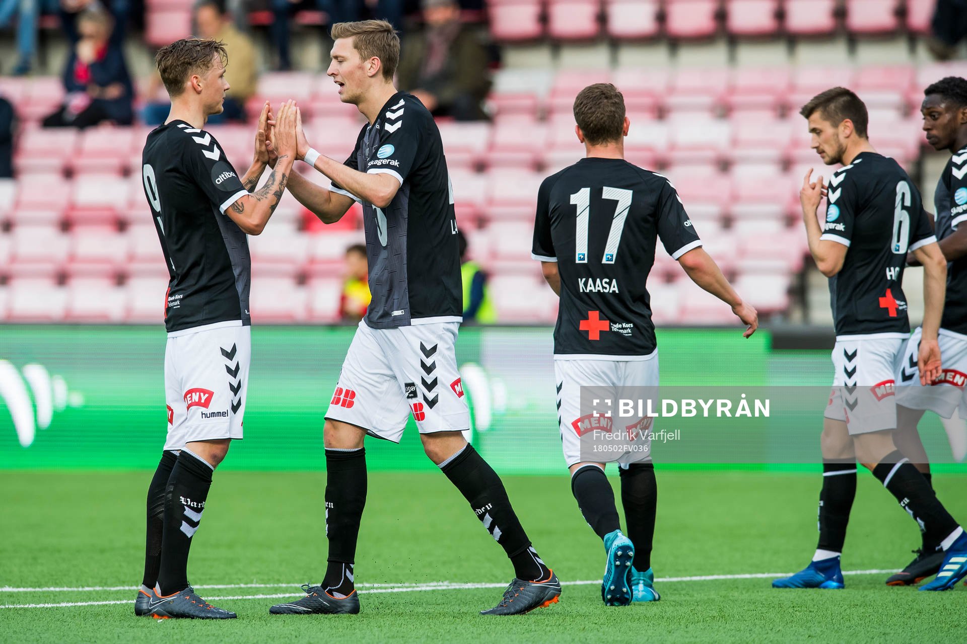 Tobias Lauritsen of Odd celebrates with Birk Risa of Odd after scoring 0-1 during the cup match between FFK and Odd on May 02, 2018 in Fredrikstad.