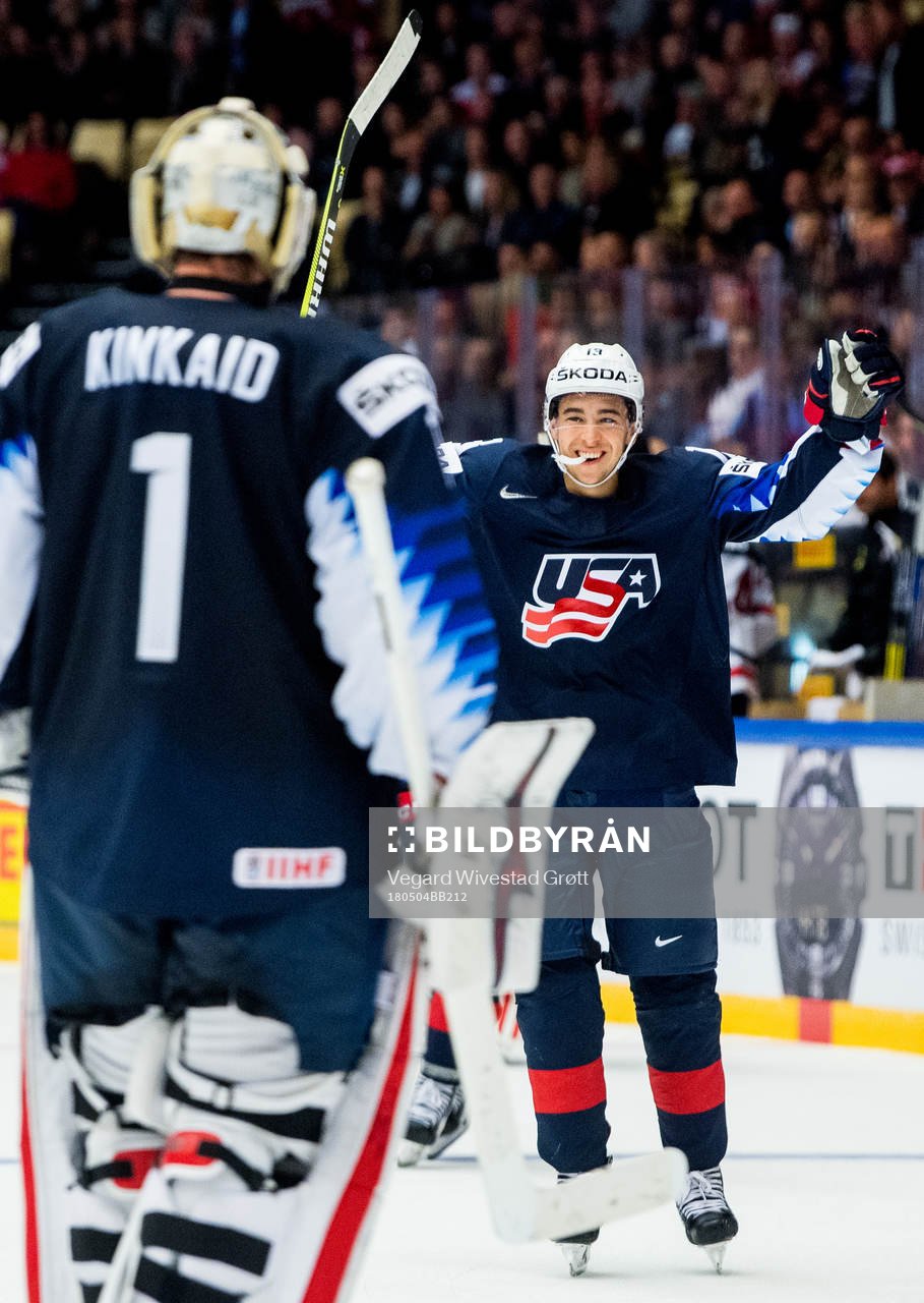 Johnny Gaudreau of USA celebrates with teammate and