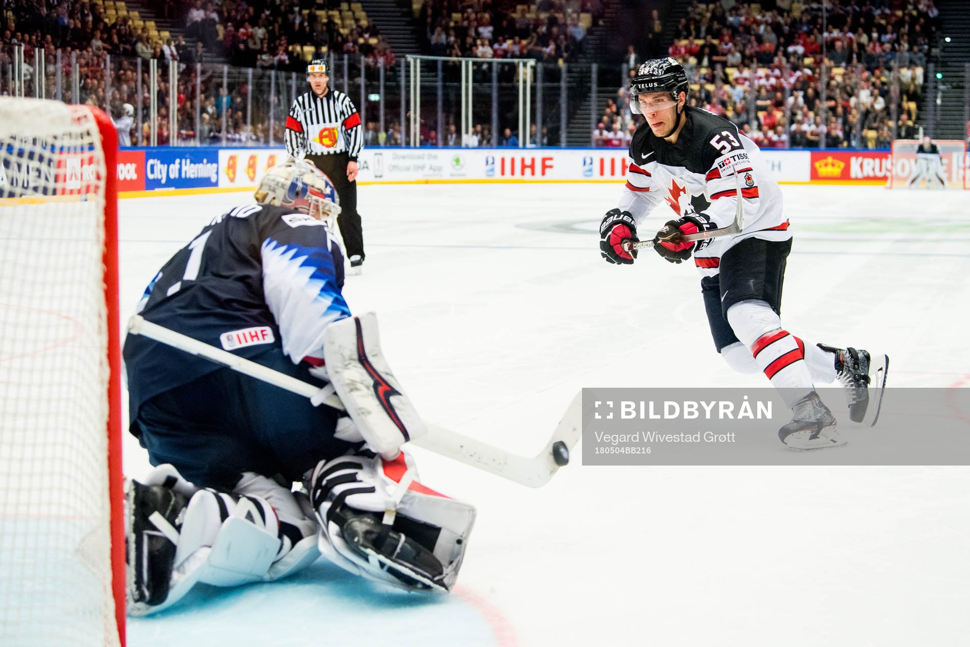Goaltender Keith Kinkaid of USA saves the penalty shoot-out