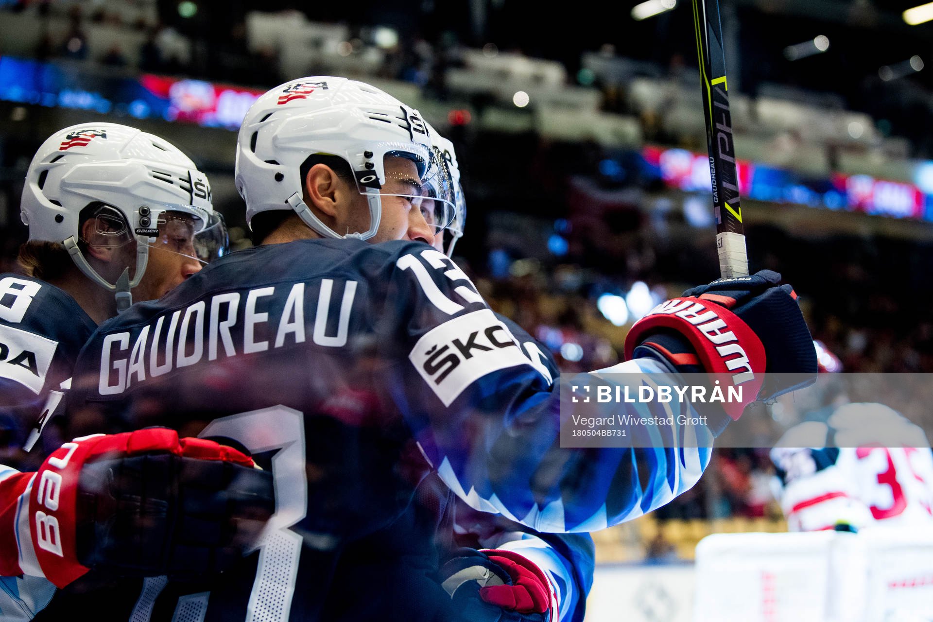 Johnny Gaudreau of USA celebrates with teammates