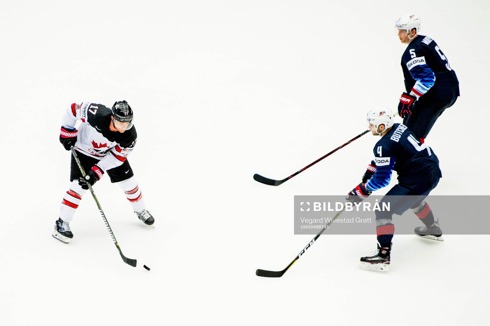 Jaden Schwartz of Canada, Will Butcher of USA and Connor