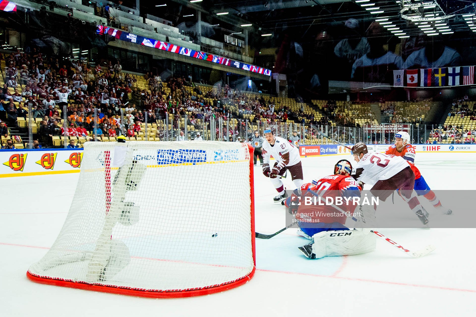 Rudolfs Balcers of Latvia scores the winning 2-3 goal