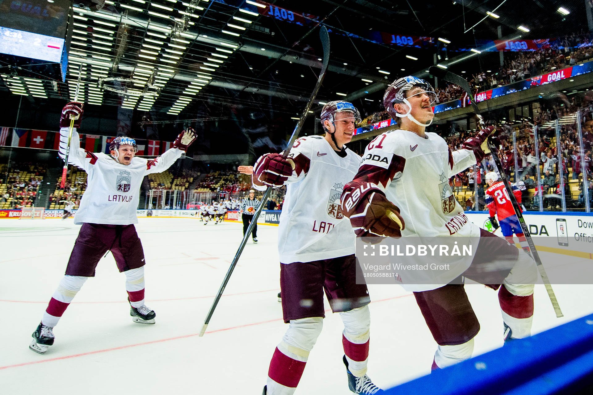 Rudolfs Balcers of Latvia celebrates with teammates