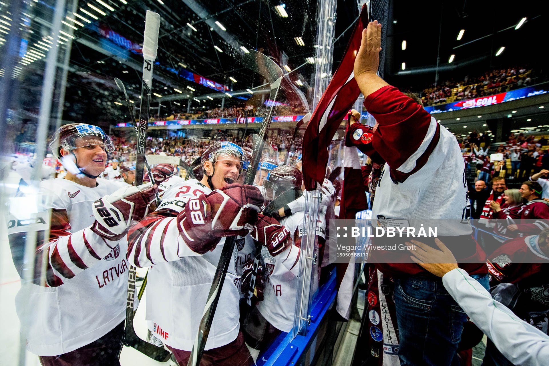 Rudolfs Balcers of Latvia celebrates with Andris Dzerins,