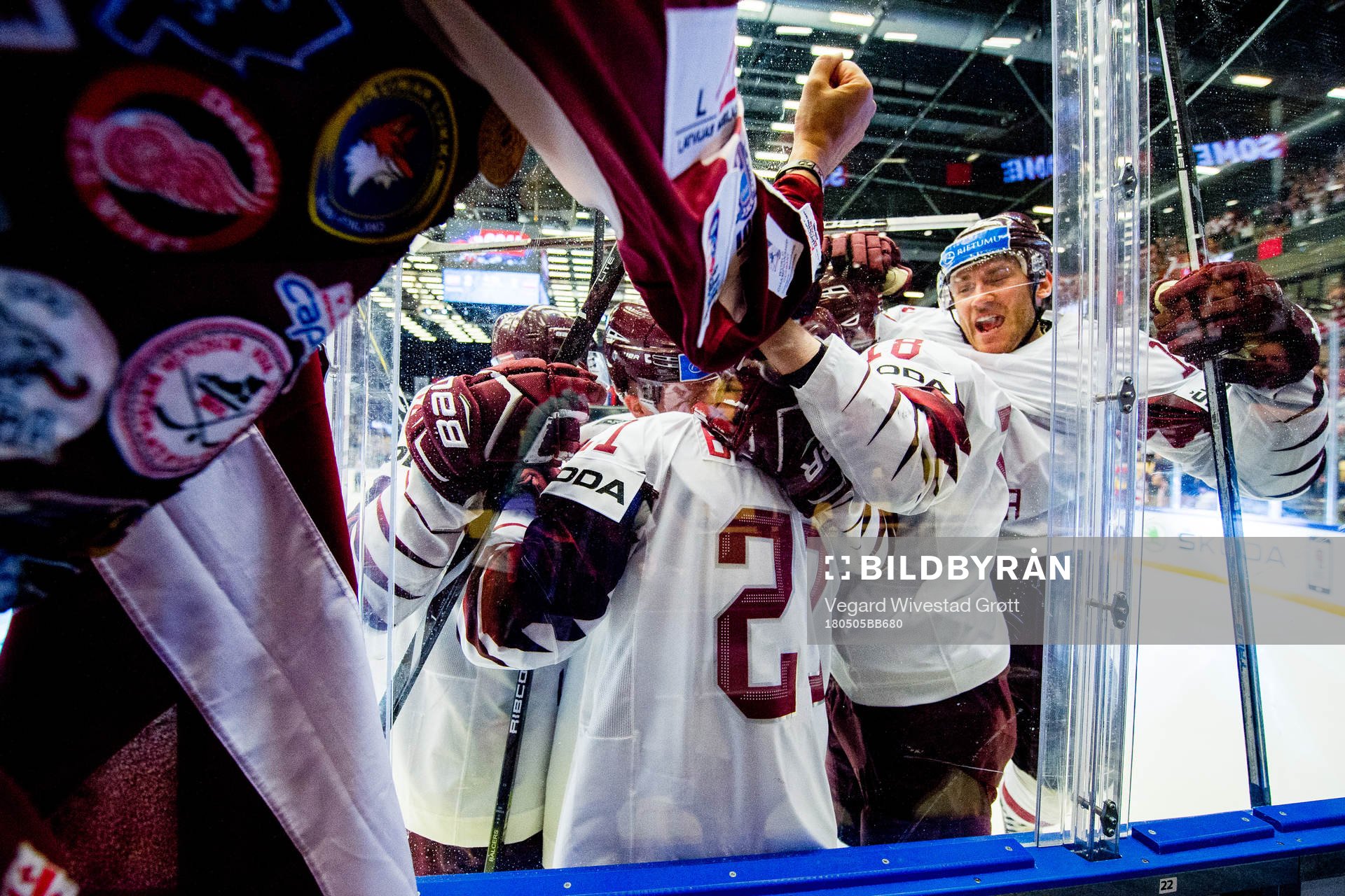 Rudolfs Balcers of Latvia celebrates with Andris Dzerins,