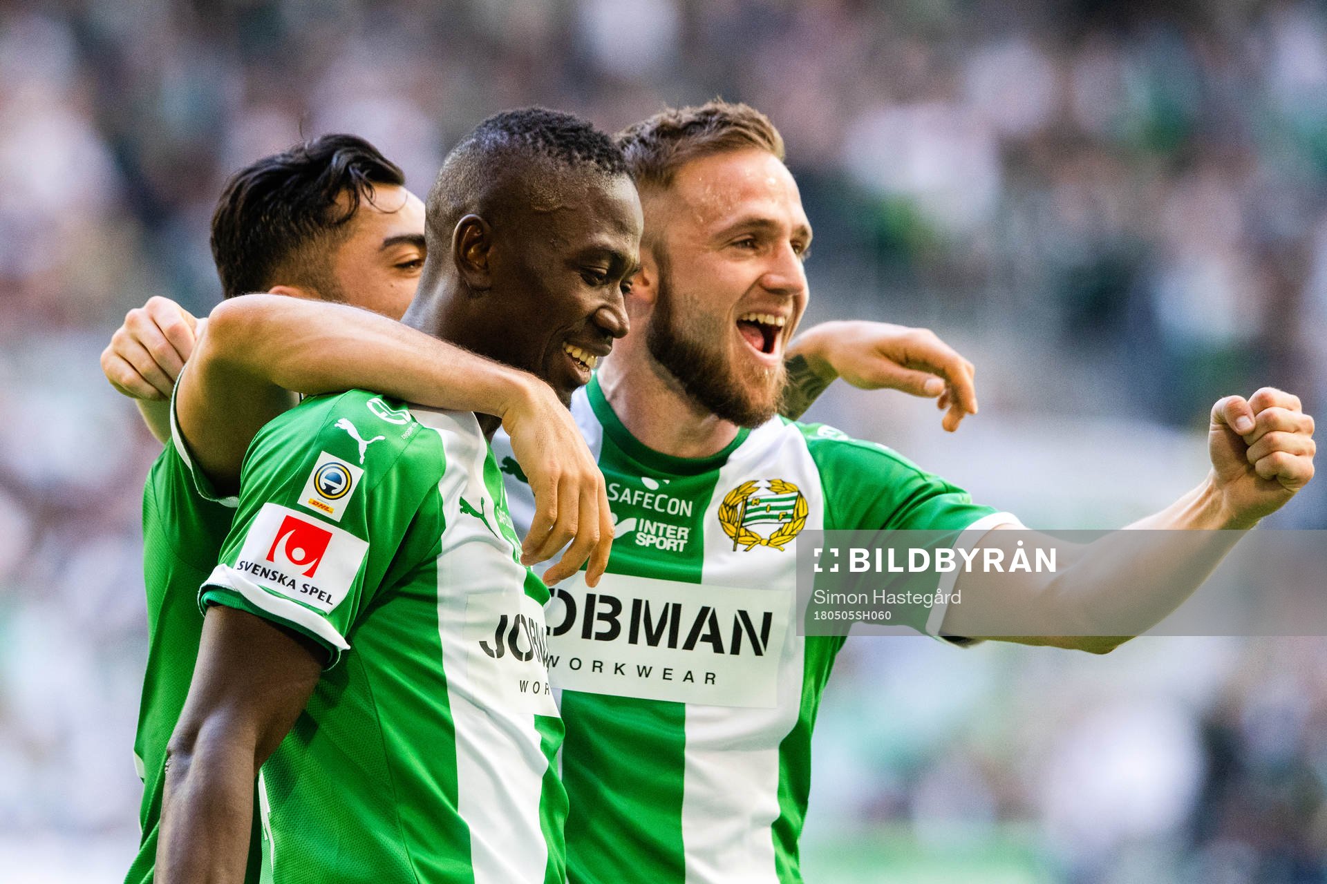Hammarbys Jiloan Hamad och Pa Amat Dibba och Mats Solheim jublar efter 2-0 under fotbollsmatchen i Allsvenskan mellan Hammarby och GIF Sundsvall den 5 maj 2018 i Stockholm.
