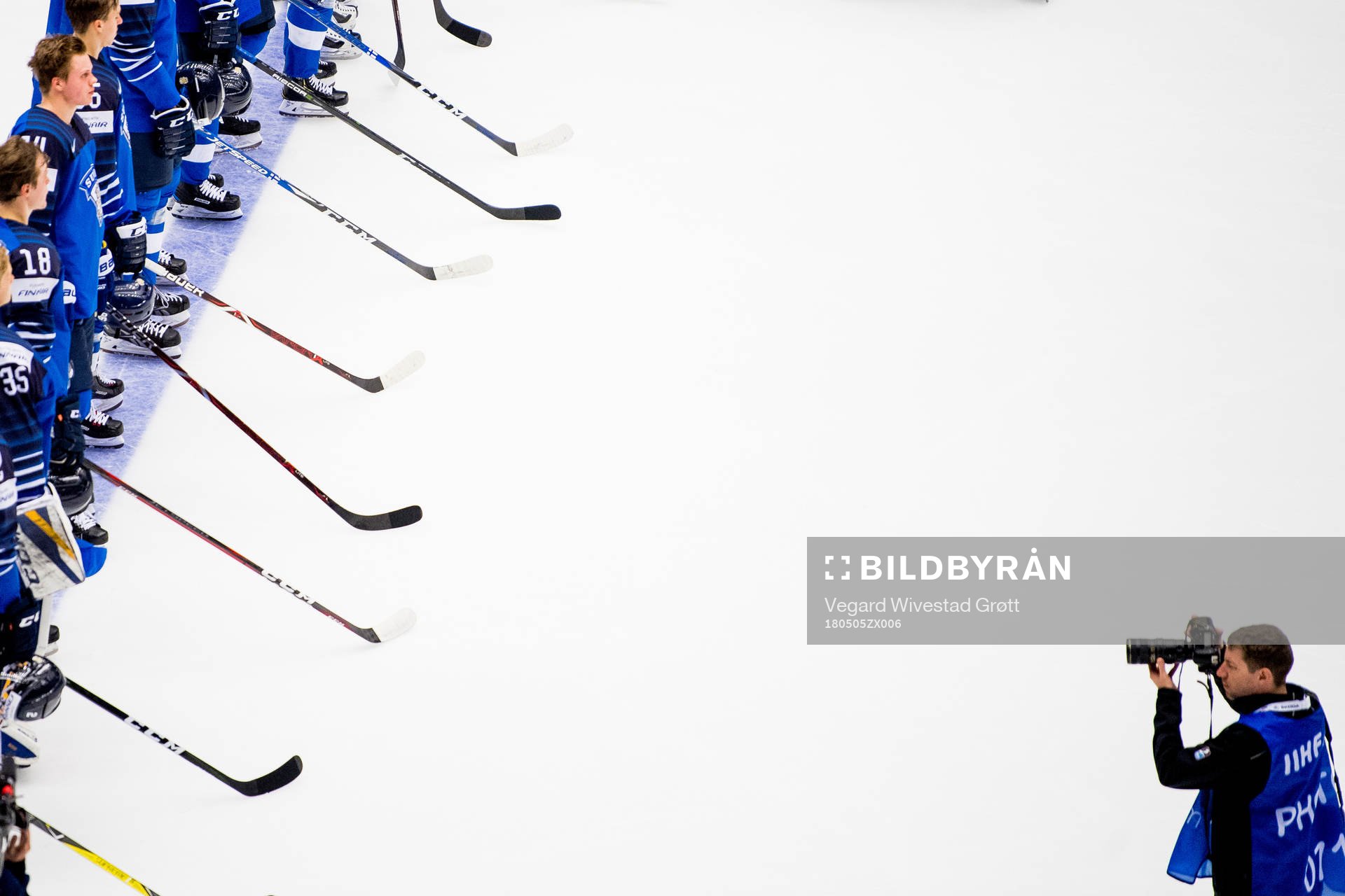 Players of Finland is taken pictures of by IIHF