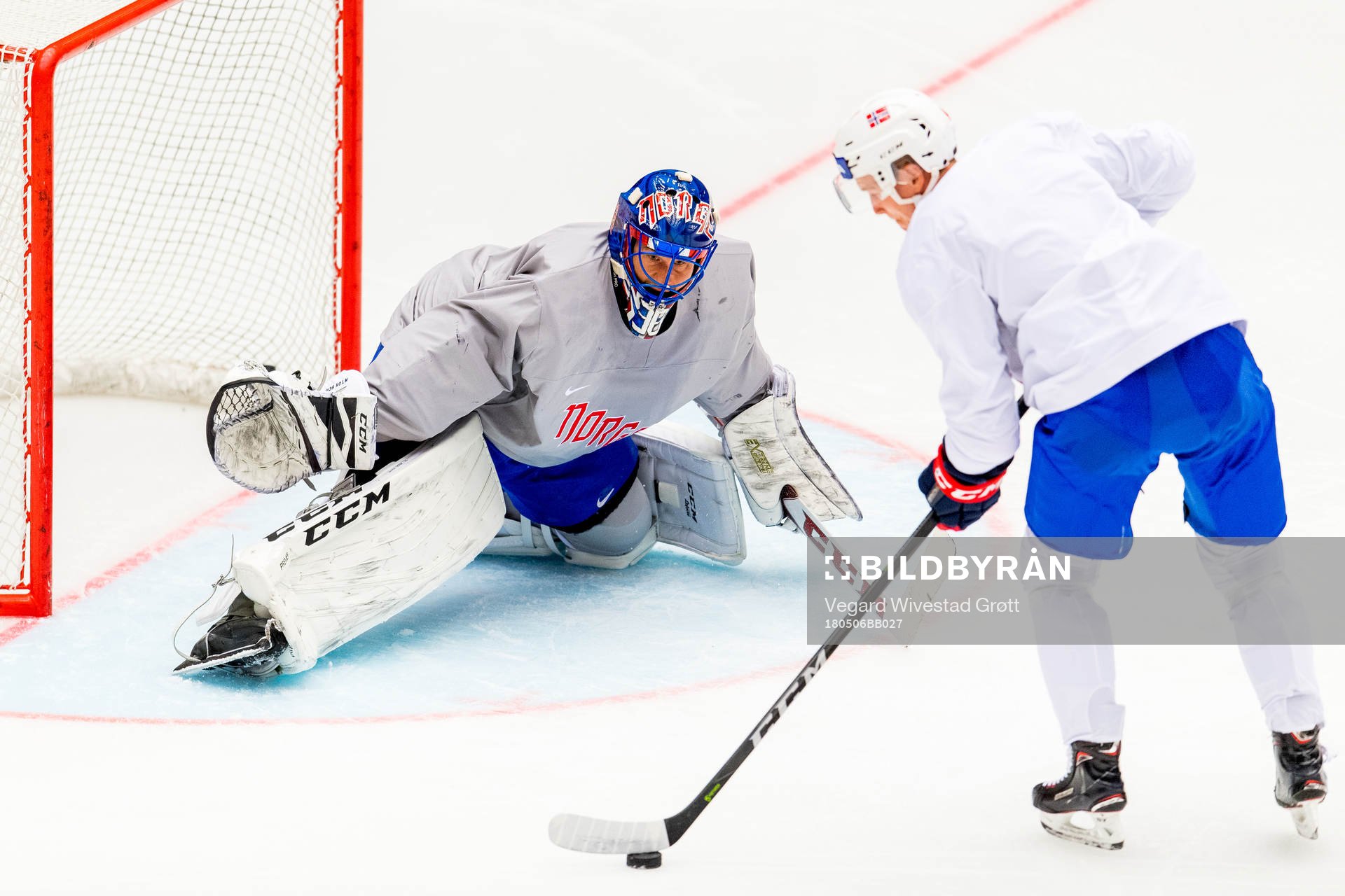 Goaltender Henrik Haukeland and Dennis Sveum of Norway