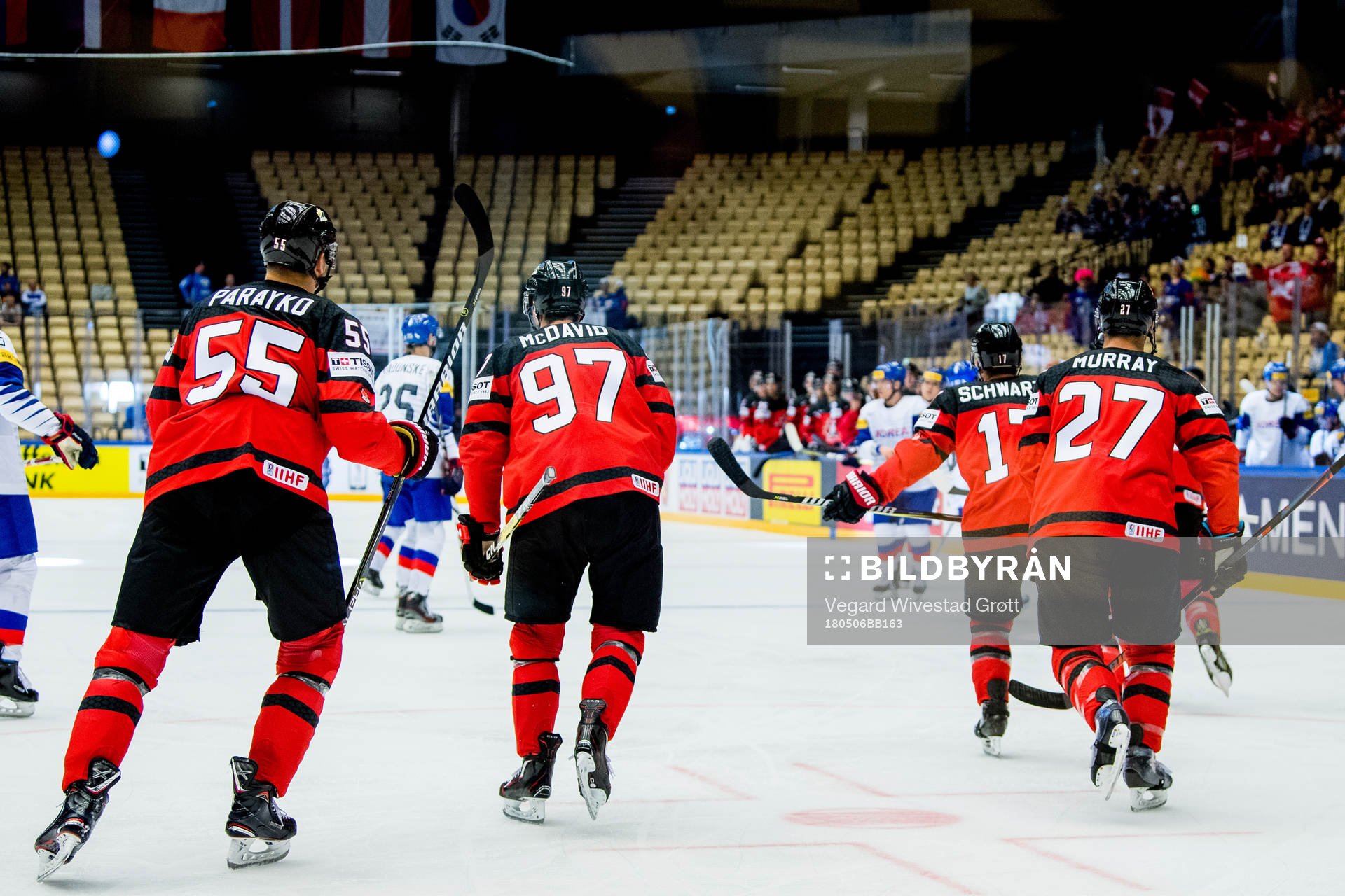 Colton Parayko, Connor McDavid and Ryan Murray of Canada