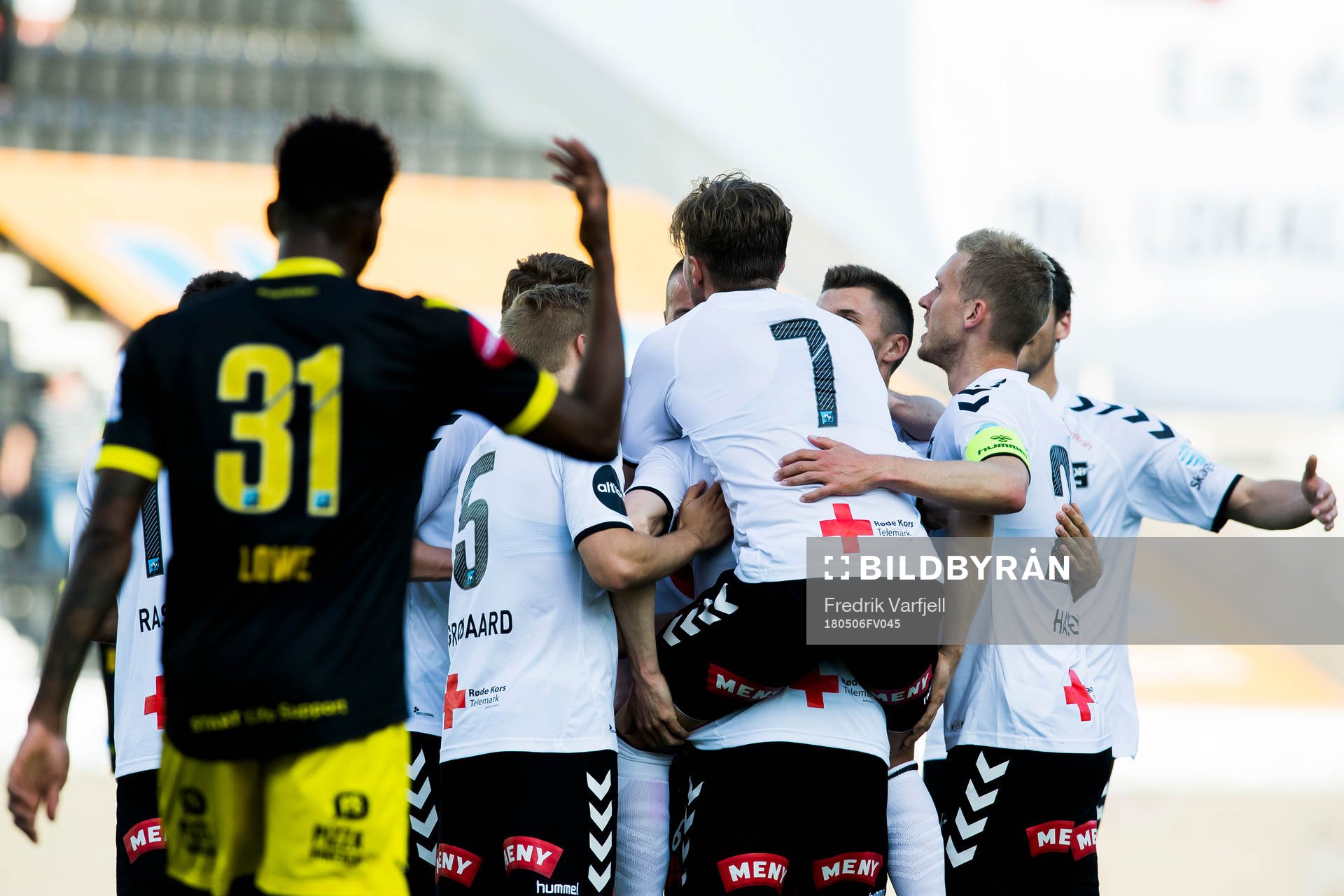 Fredrik Nordkvelle of Odd celebrates with his teammates after scoring 1-0 during the Eliteserien match between Odd and Start on May 6, 2018 in Skien.