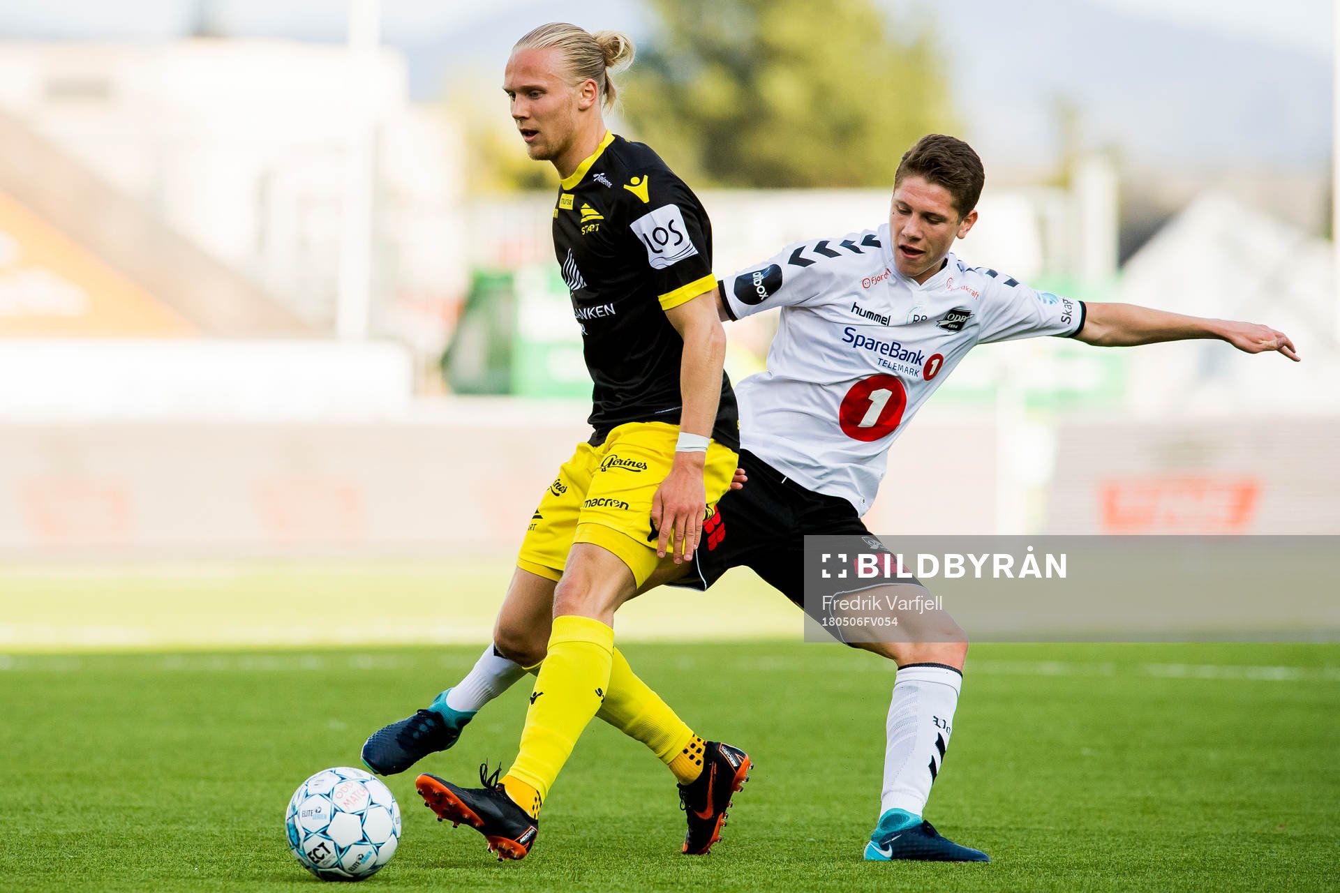 Lars Jørgen Salvesen of Start and Markus André Kaasa of Odd during the Eliteserien match between Odd and Start on May 6, 2018 in Skien.