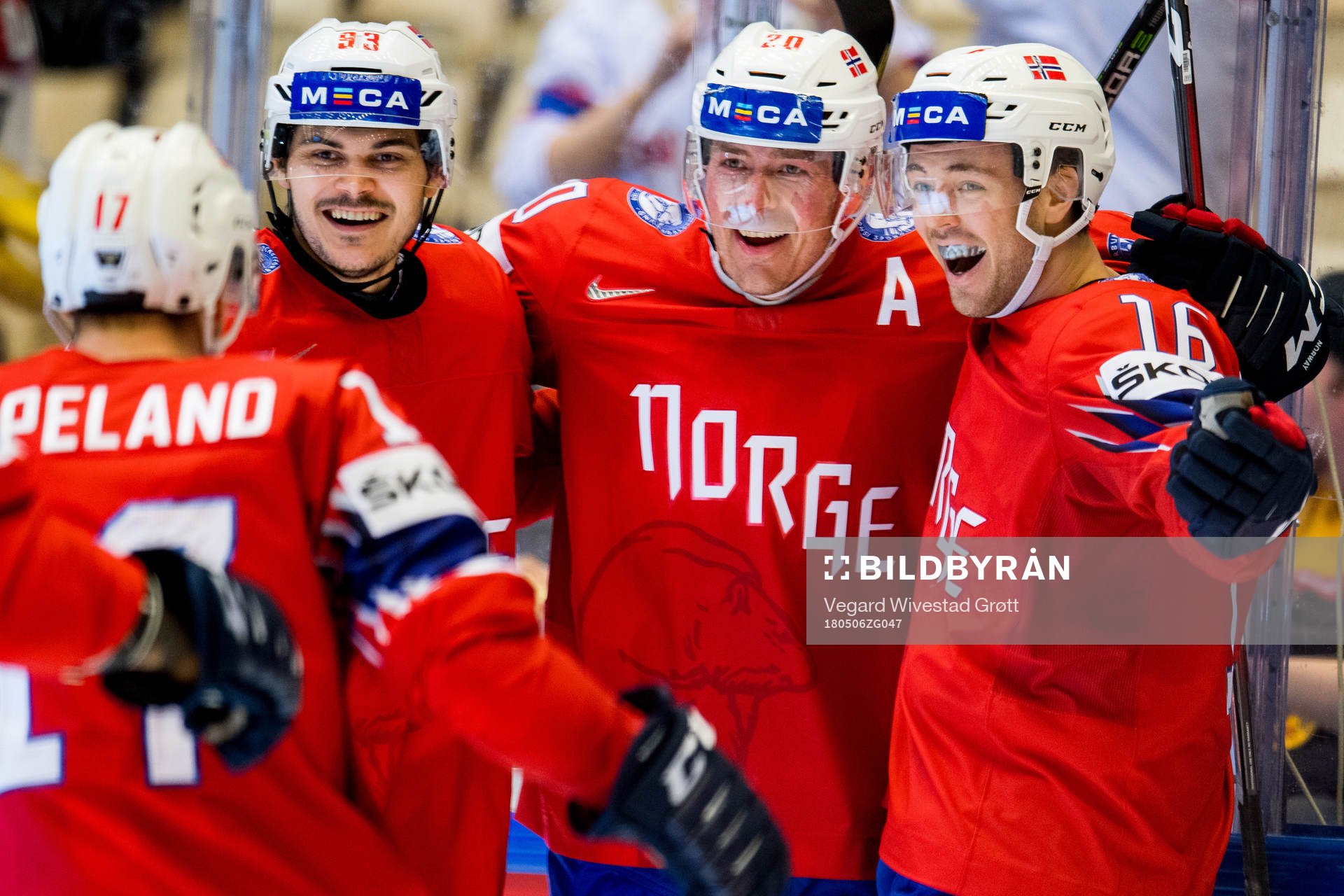 Anders Bastiansen of Norway celebrates with teammates