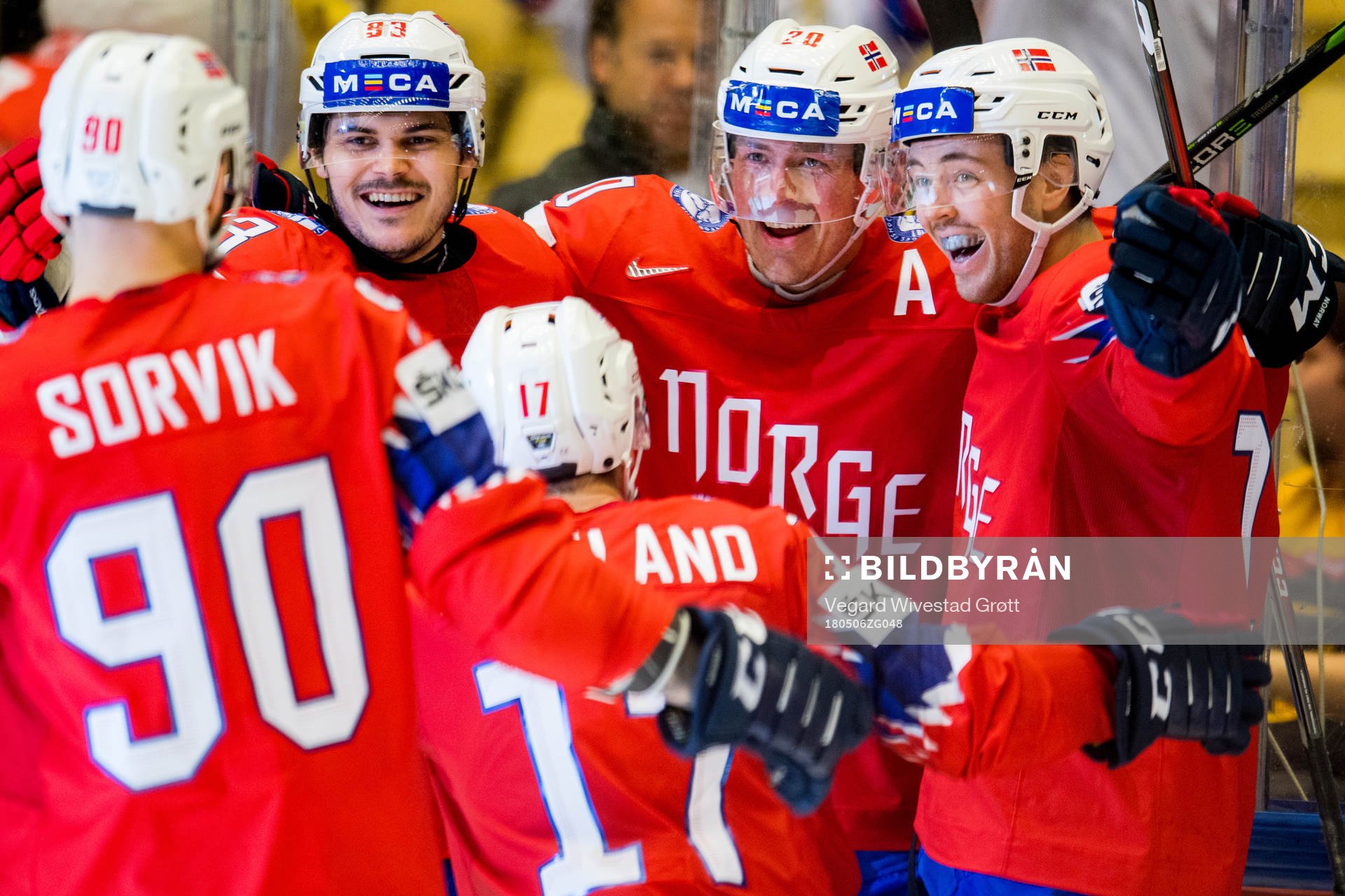 Anders Bastiansen of Norway celebrates with teammates