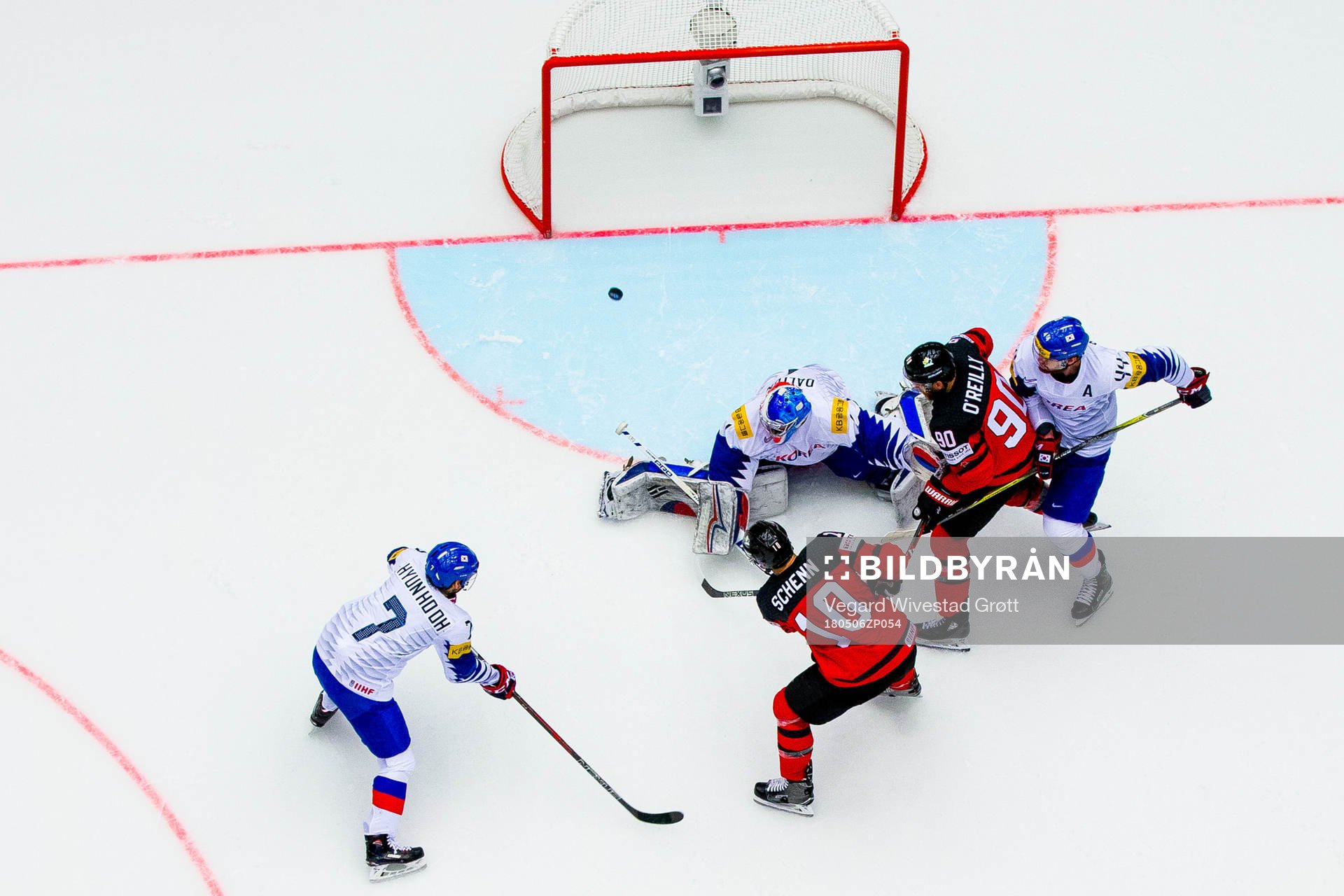 Brayden Schenn of Canada scores 6-0 behind goaltender Matt