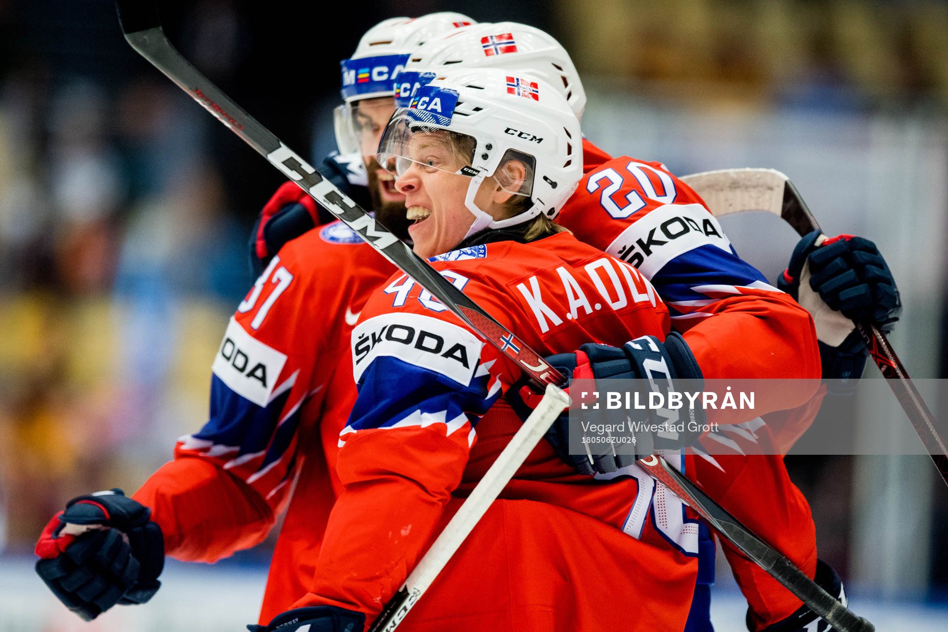 Ken Andre Olimb of Norway celebrates with teammates