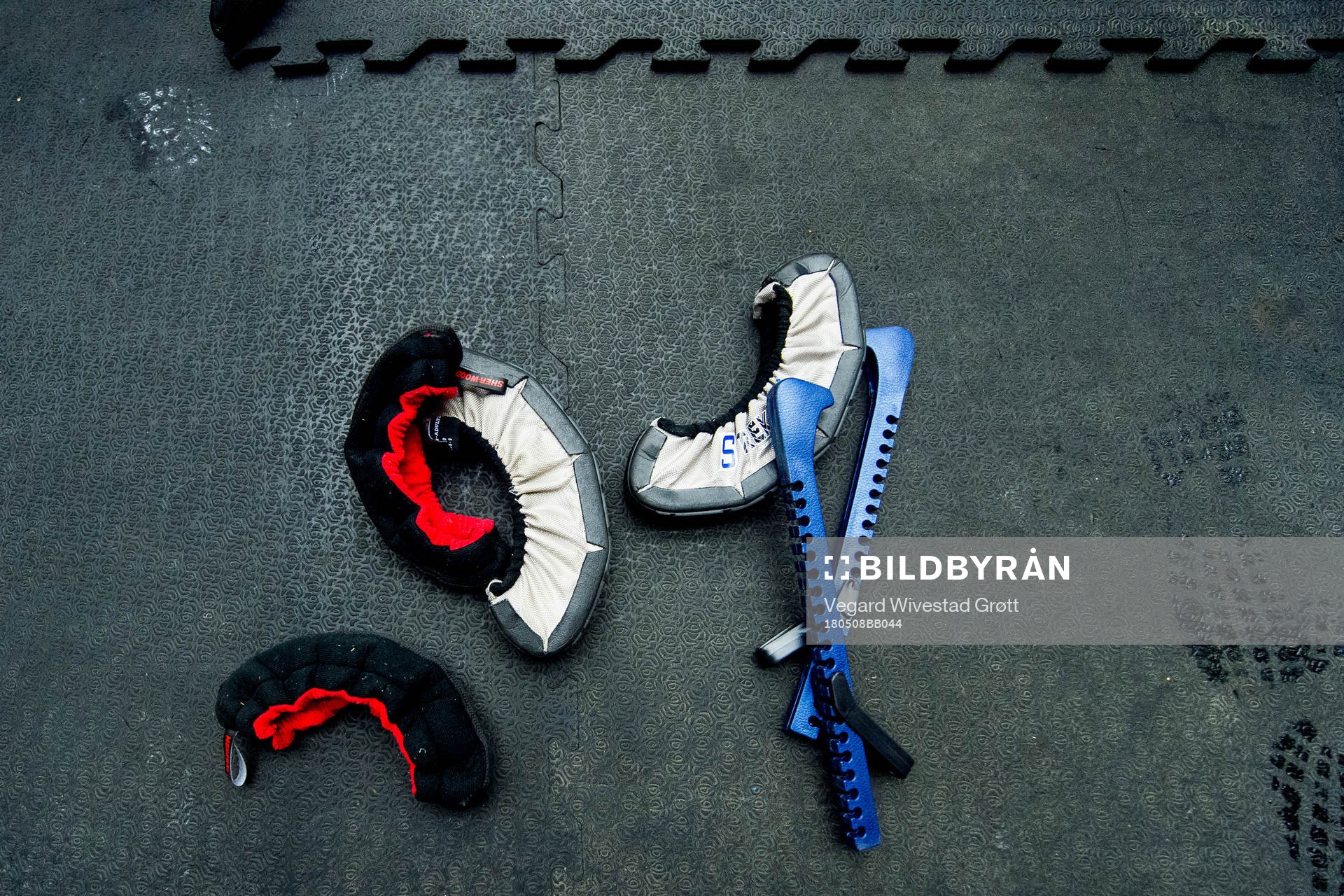 Ice hockey skate blade guards