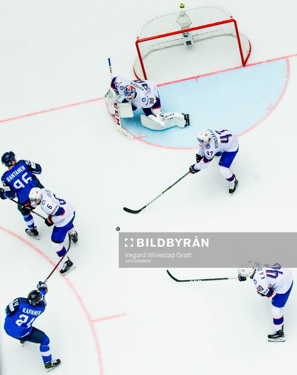 Kasperi Kapanen of Finland scores 4-0 past Jonas Holøs,