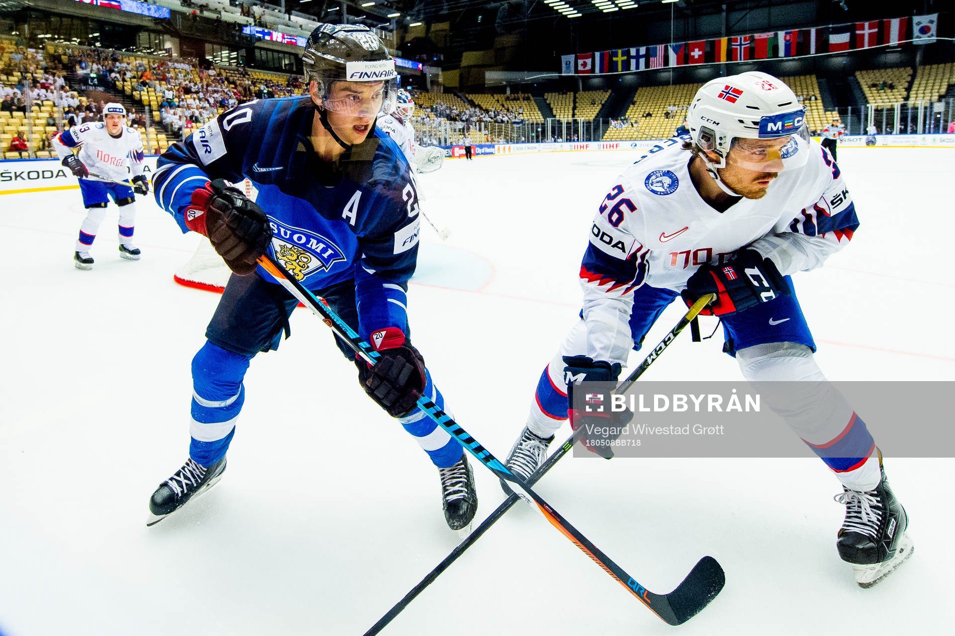 Sebastian Aho of Finland and Kristian Forsberg of Norway