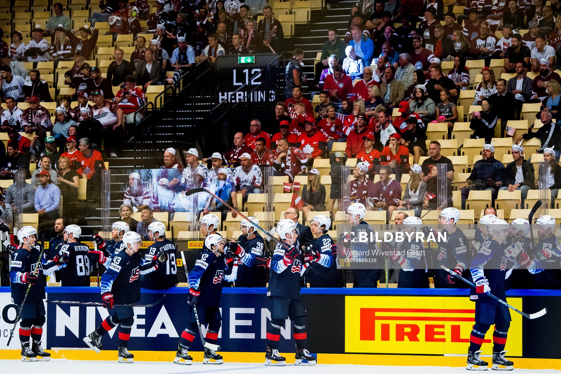 Chris Kreider of USA celebrates with teammates