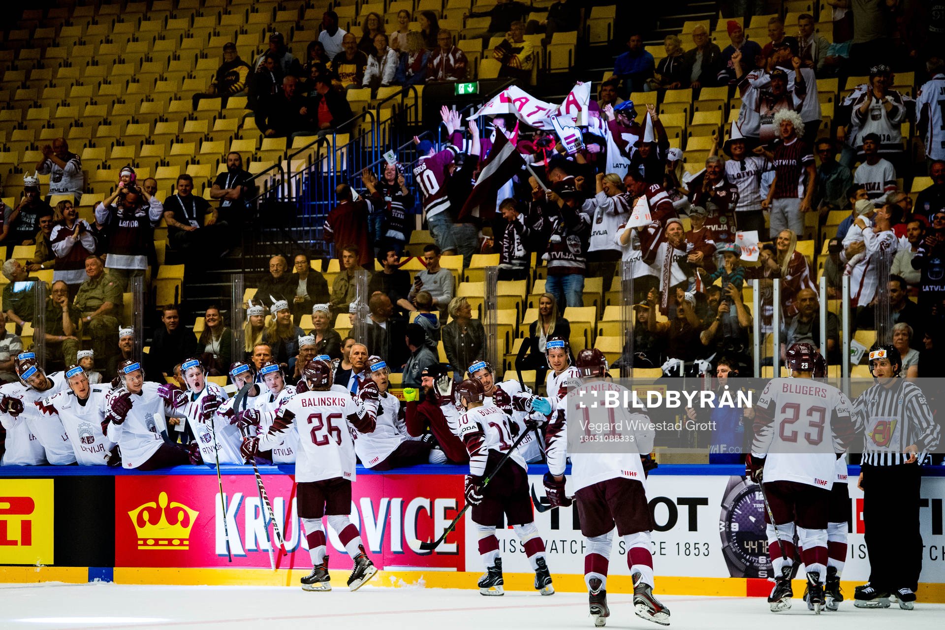 Uvis Janis Balinskis of Latvia celebrates with teammates
