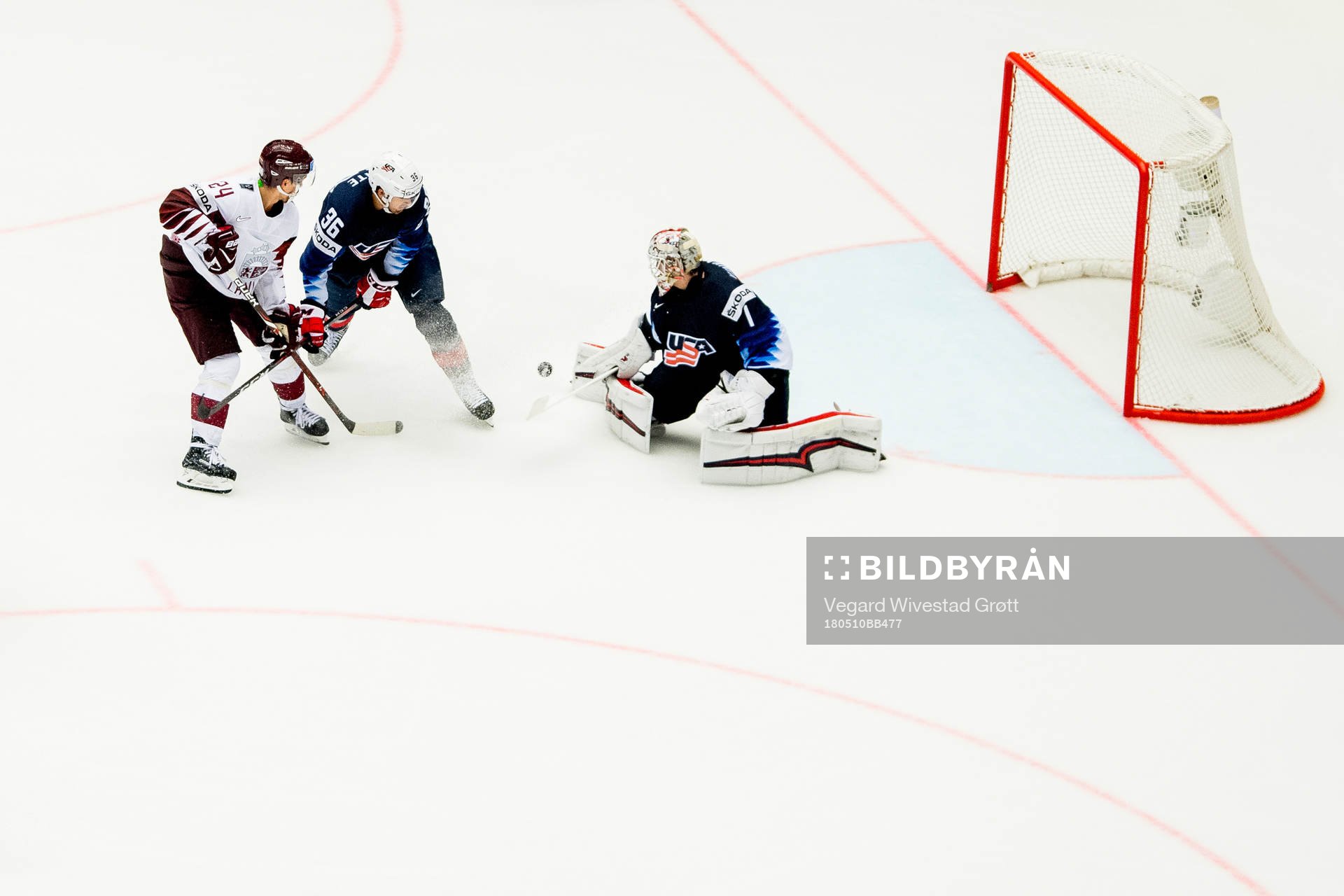 Mikelis Redlihs of Latvia, Colin White of USA and