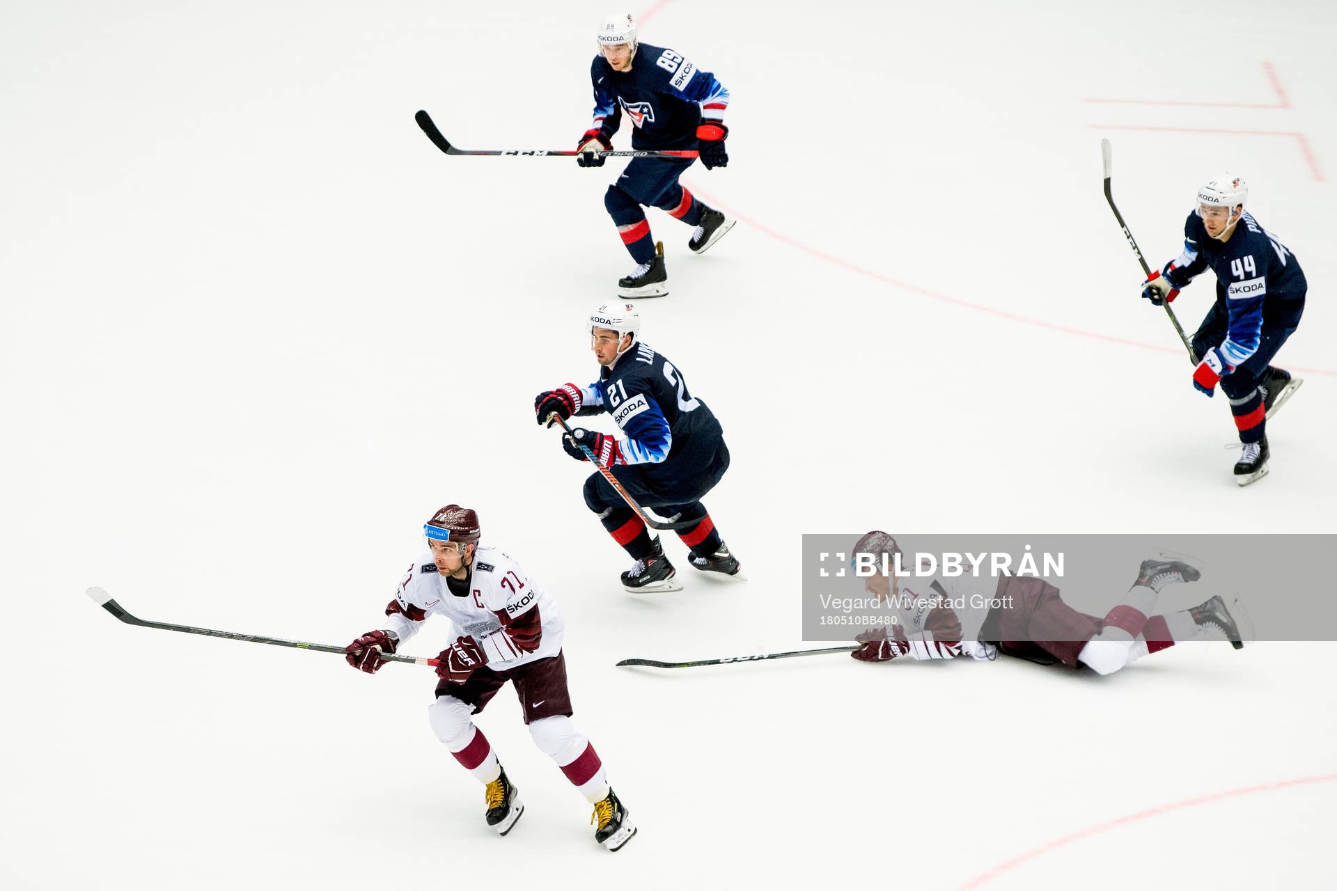 Roberts Bukarts of Latvia, Dylan Larkin of USA, Cam