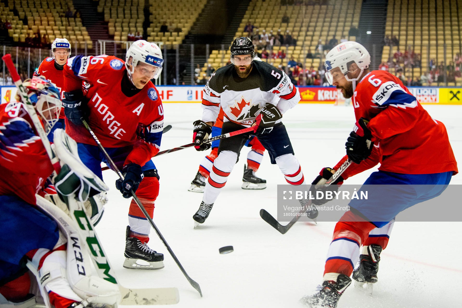 Mathis Olimb of Norway, Aaron Ekblad of Canada and Jonas