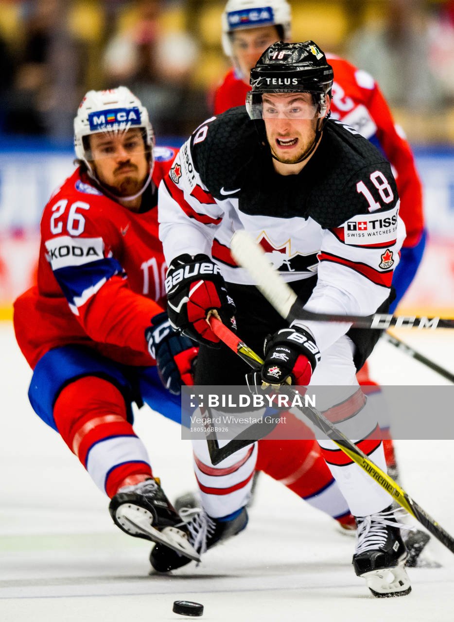 Kristian Forsberg of Norway and Pierre-Luc Dubois of Canada