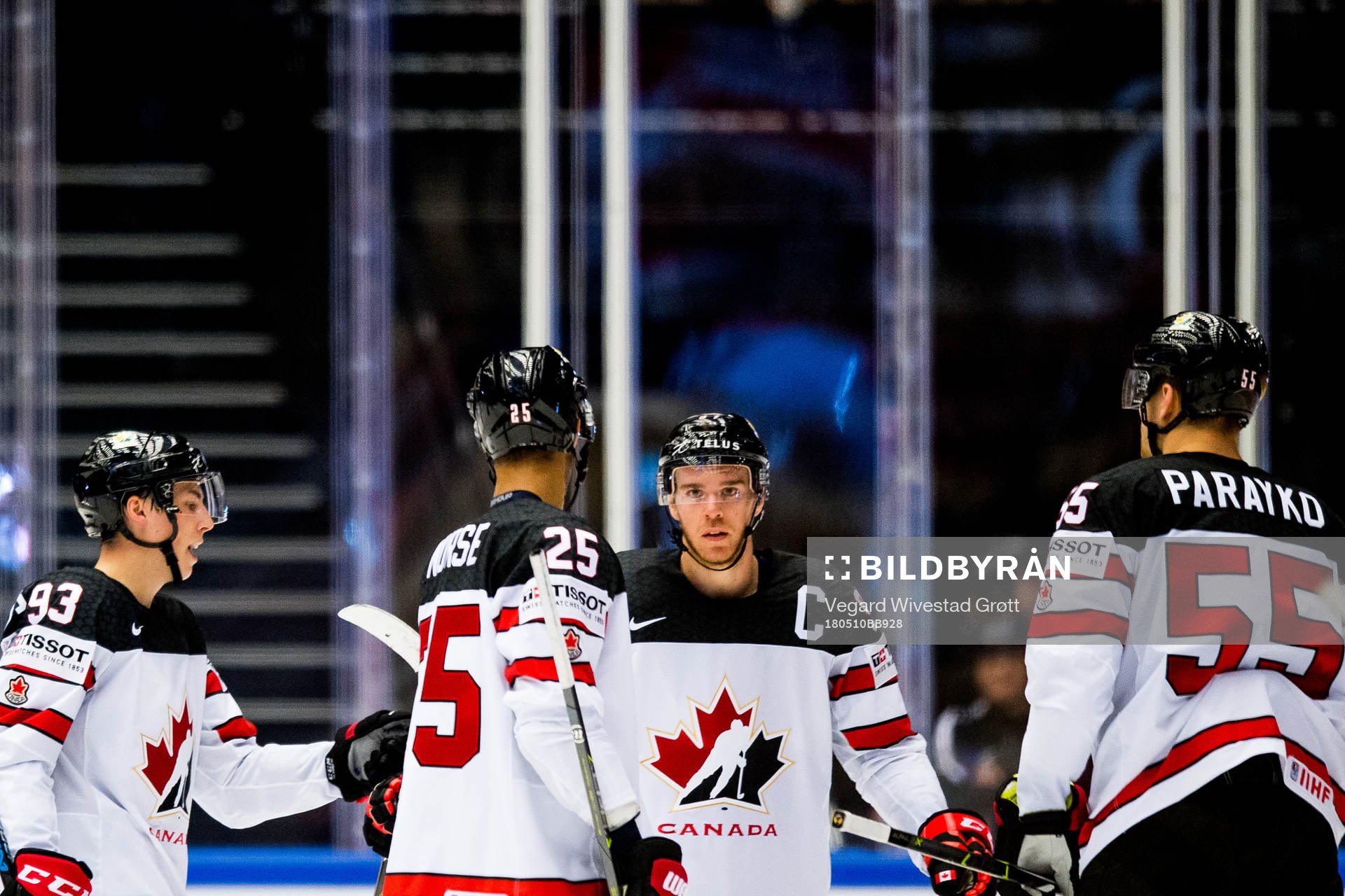 Connor McDavid of Canada celebrates with teammates Ryan