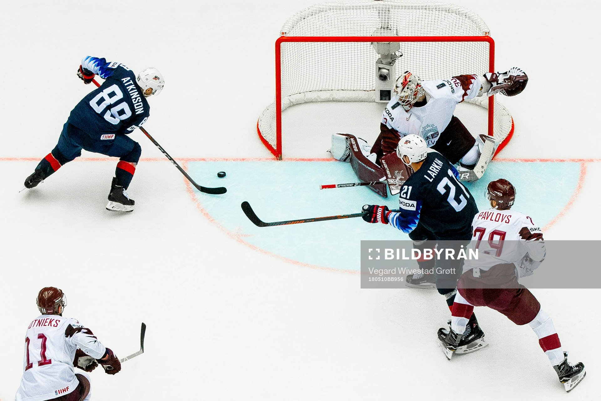 Cam Atkinson of USA scores the 3-2 winning over-time goal