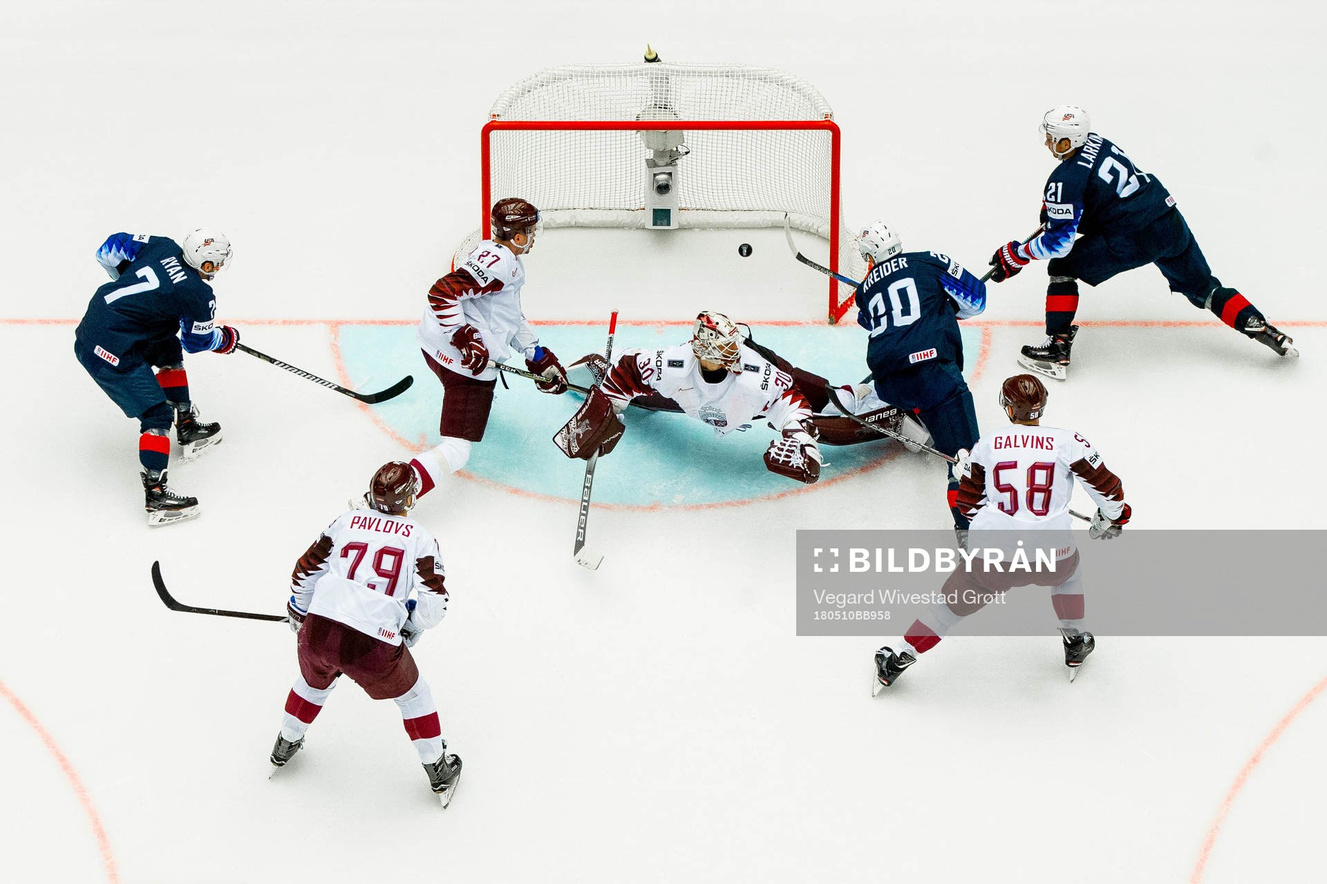 Chris Kreider of USA scores 1-0 behind goaltender Elvis