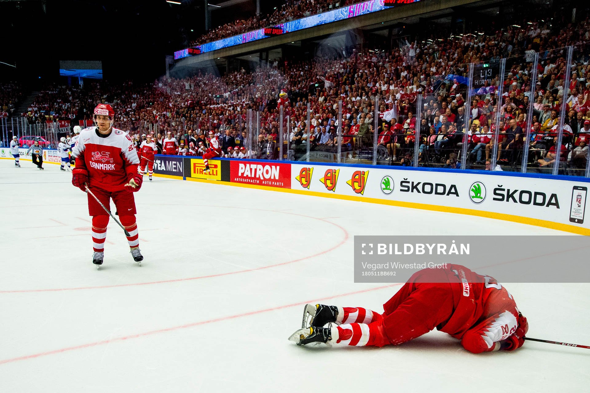 Oliver Lauridsen of Denmark lies down with an injury