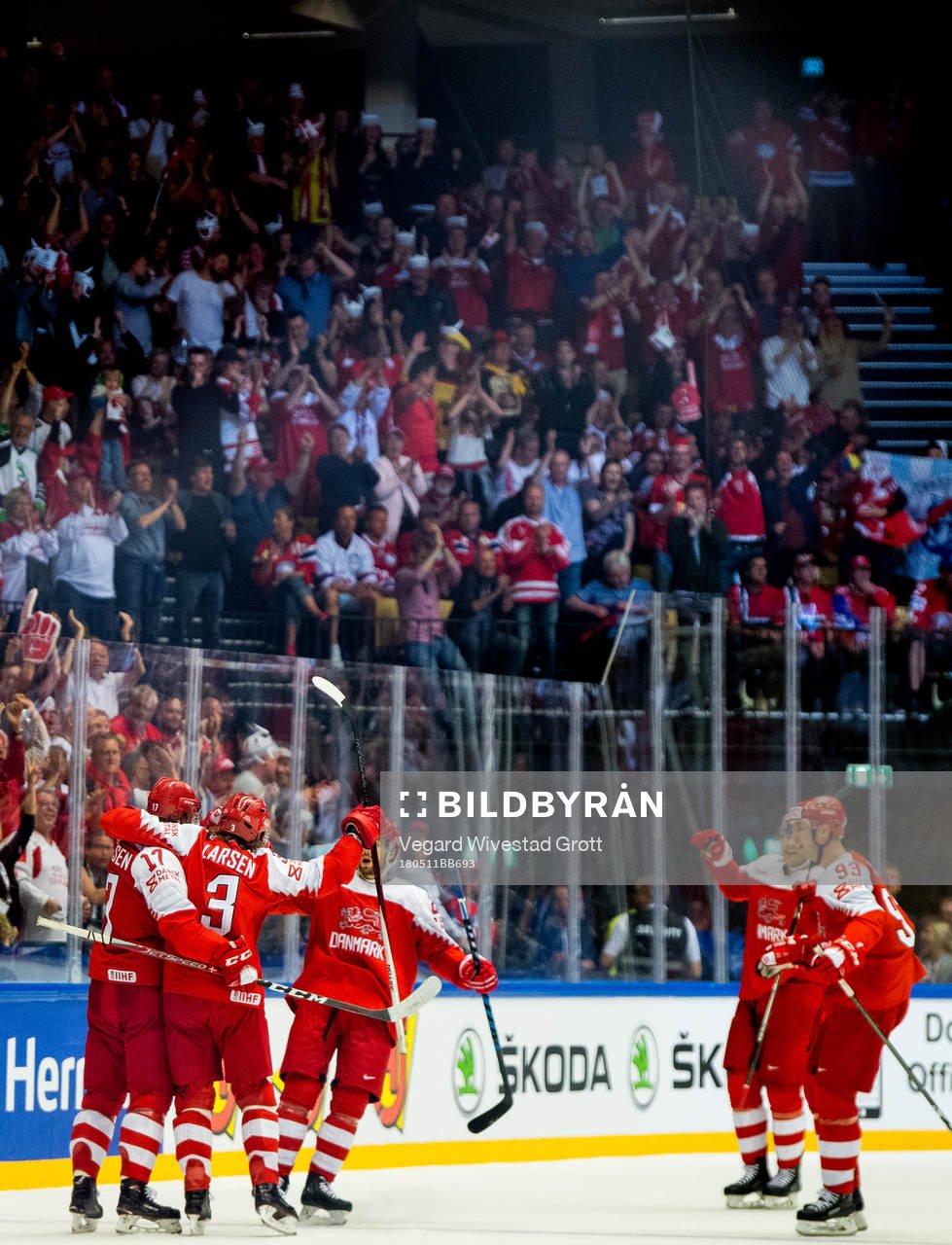Nicklas Jensen of Denmark celebrates with teammates