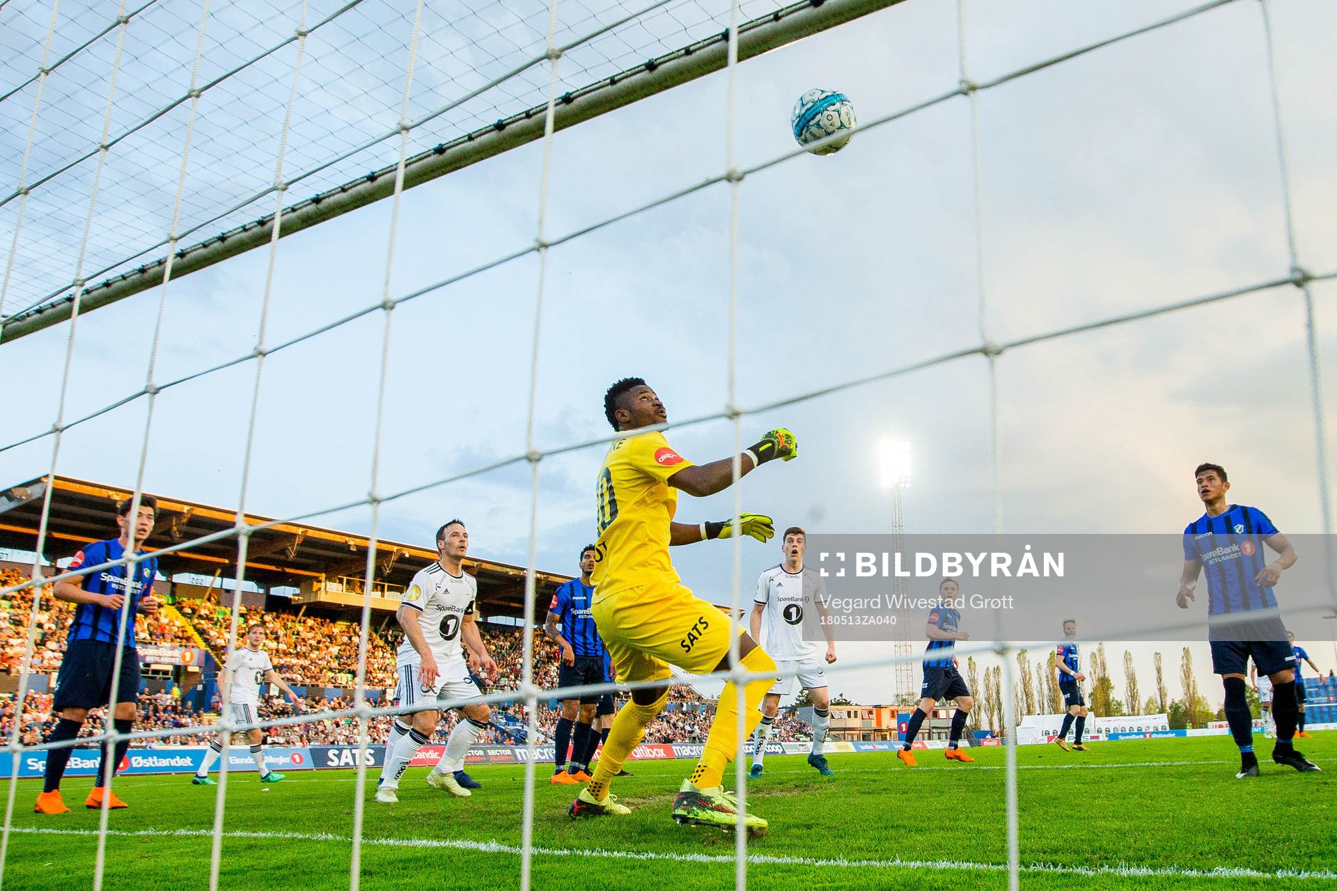 Mike Jensen of Rosenborg, goalkeeper Mandé Sayouba of