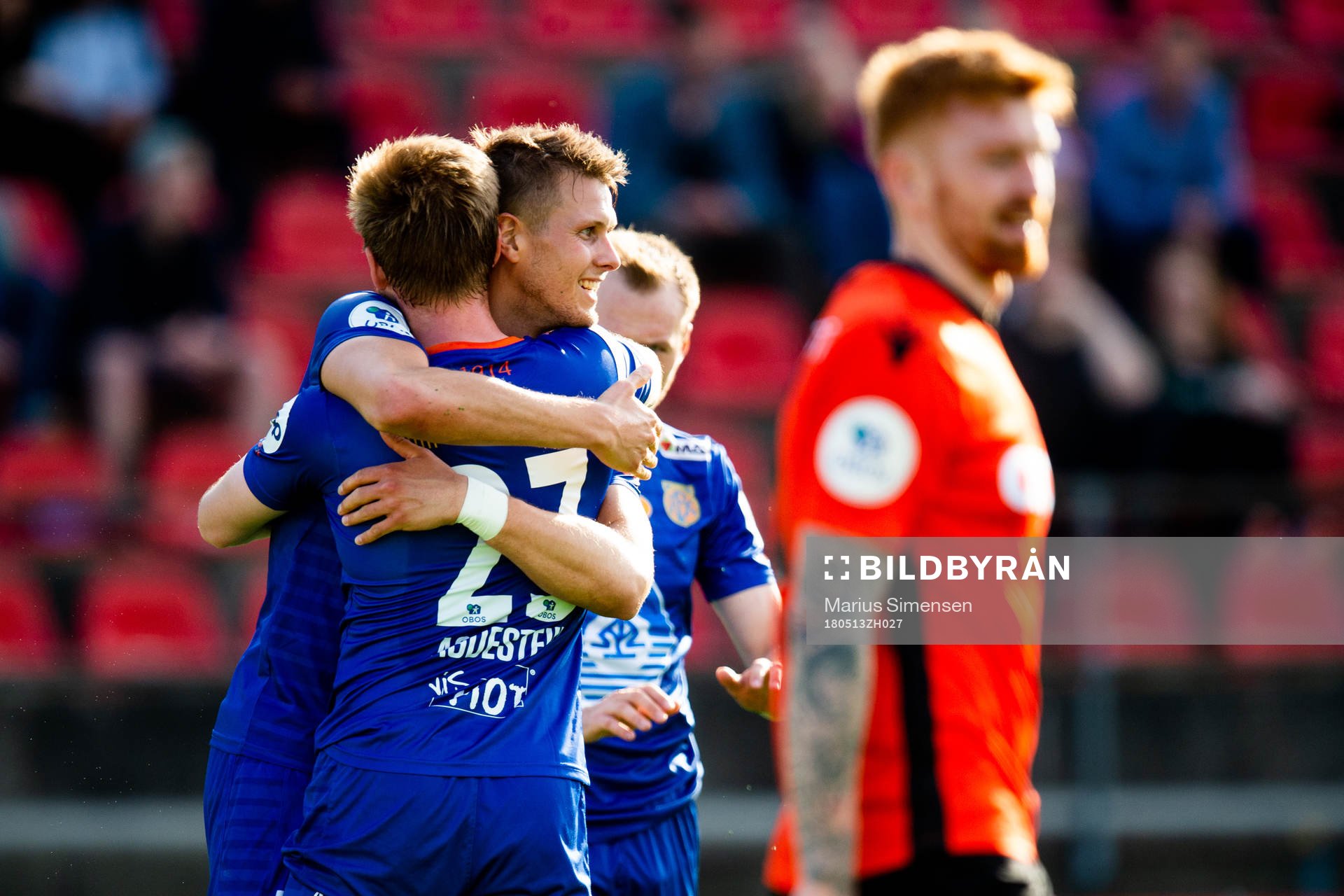 Torbjørn Agdestein of Aalesund celebrates with teammates after the 1-2 goal during the OBOS-ligaen match between Åsane and Aalesund on May 13, 2018 in Åsane.
