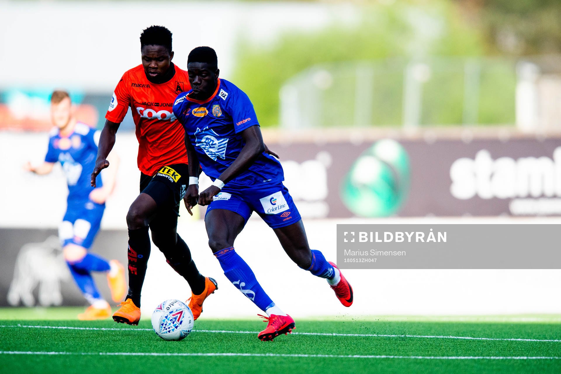 Michael Olusoji Ogungbaro of Åsane and Pape Habib Gueye of Aalesund during the OBOS-ligaen match between Åsane and Aalesund on May 13, 2018 in Åsane.