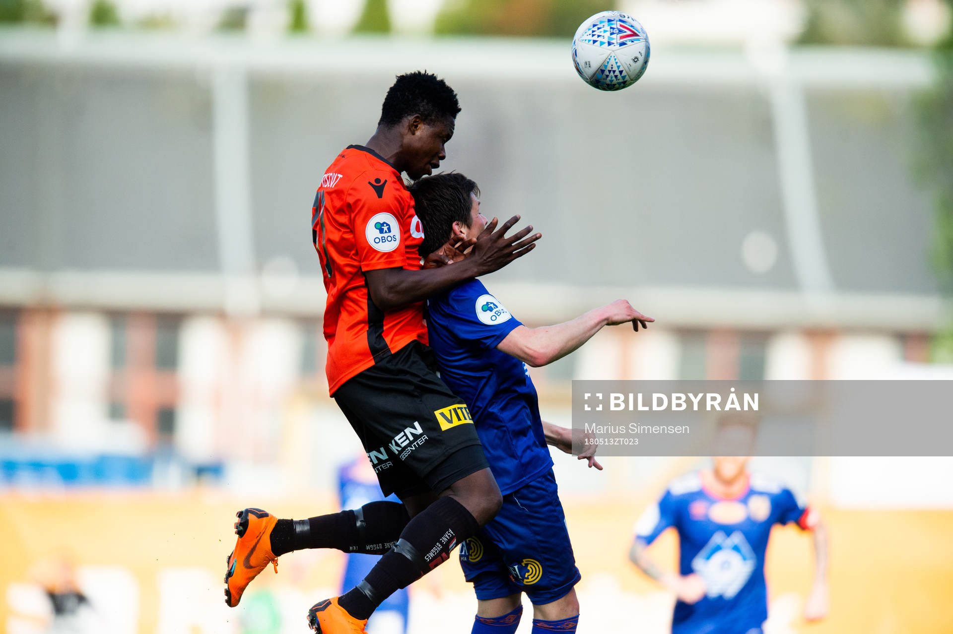 Michael Olusoji Ogungbaro of Åsane and Sondre Fet of Aalesund during the OBOS-ligaen match between Åsane and Aalesund on May 13, 2018 in Åsane.