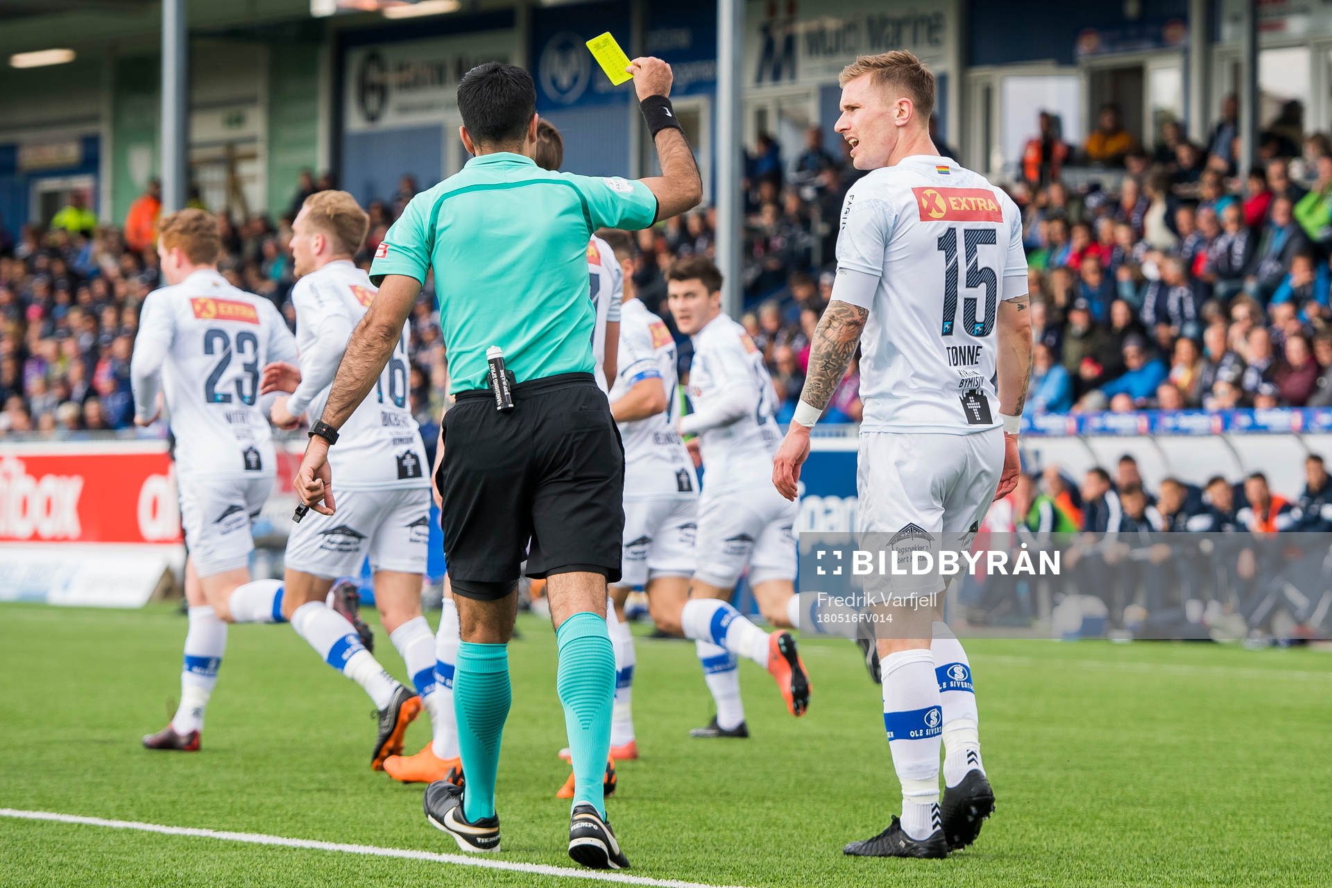 Erik Tønne of Ranheim is shown a yellow card