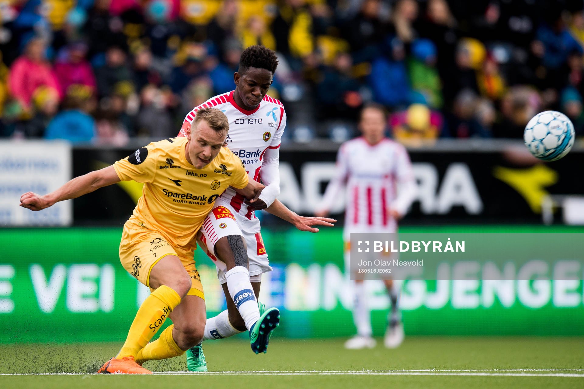 Marius Lode of Bodø/Glimt and Mushaga Bakenga of Tromsø