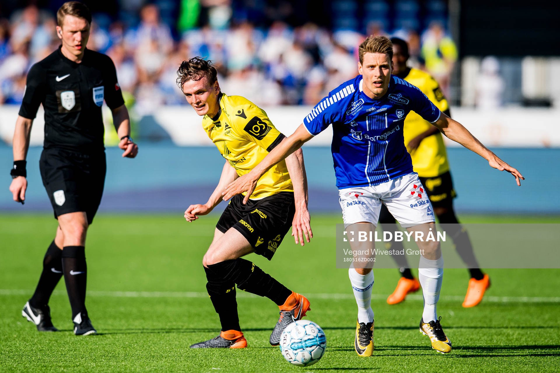 Kristjan Floki Finnbogason of Start and Kristoffer Zachariassen of Sarpsborg 08 during the Eliteserien match between Sarpsborg 08 and Start on May 16, 2018 in Sarpsborg. 
