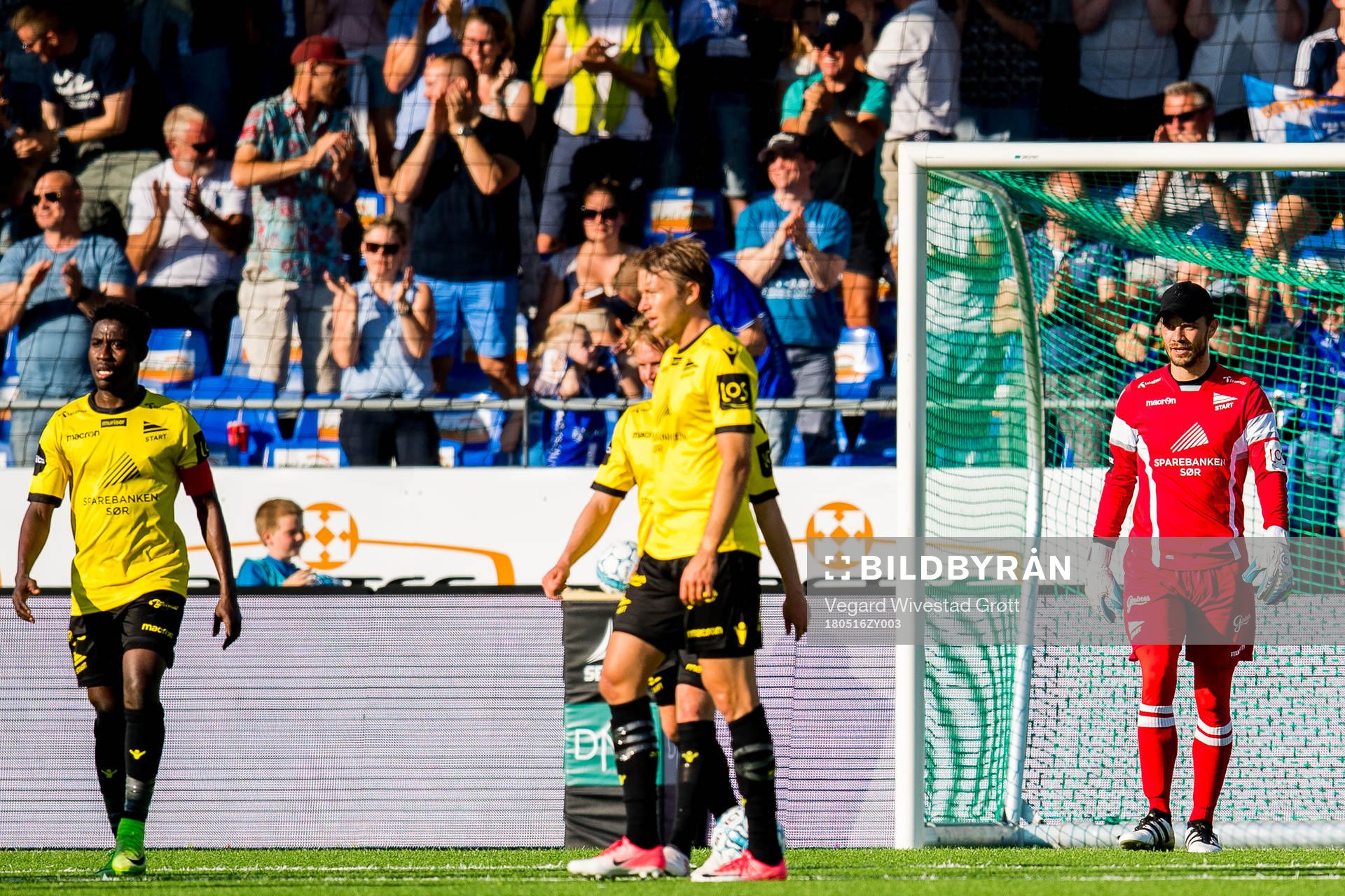 Isaac Twum and goalkeeper Jonas Deumeland of Start look