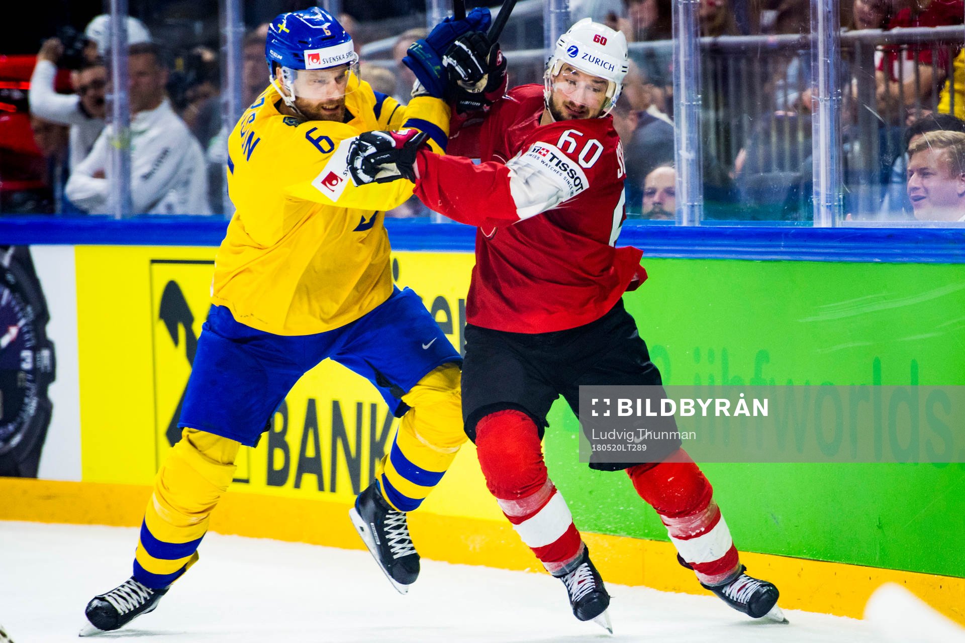 Sveriges Adam Larsson och Schweiz Tristan Scherwey