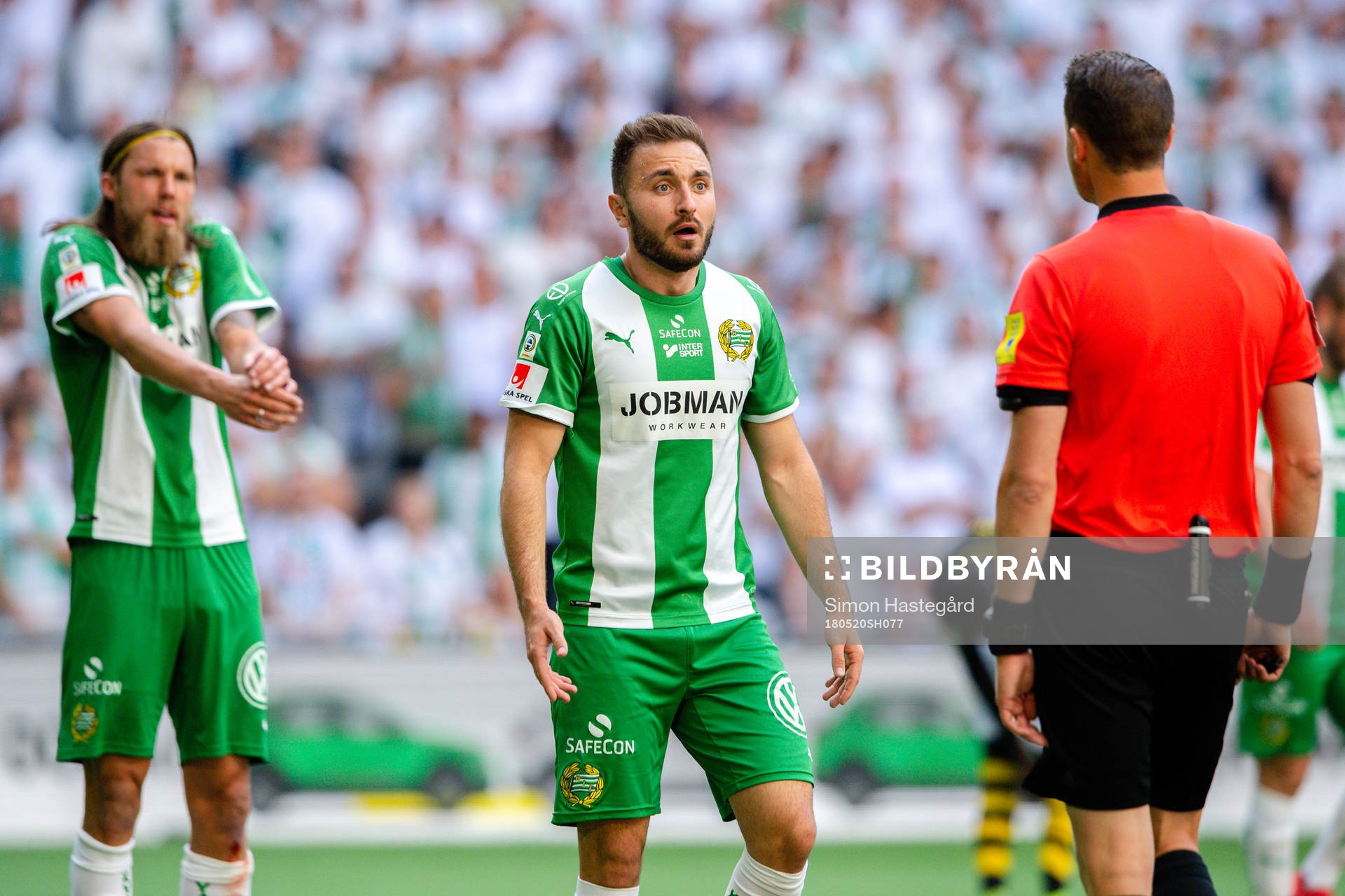 Hammarbys Björn Paulsen och Muamer Tankovic  i samtal med