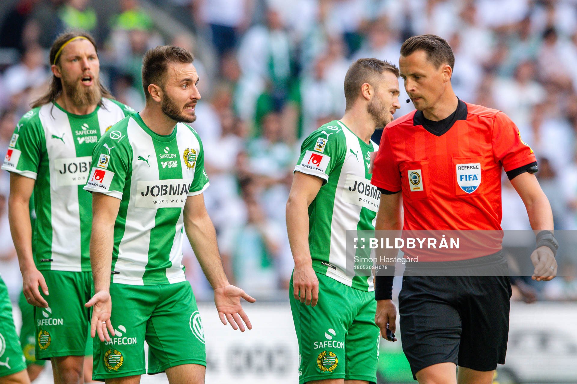 Hammarbys Björn Paulsen och Muamer Tankovic  i samtal med
