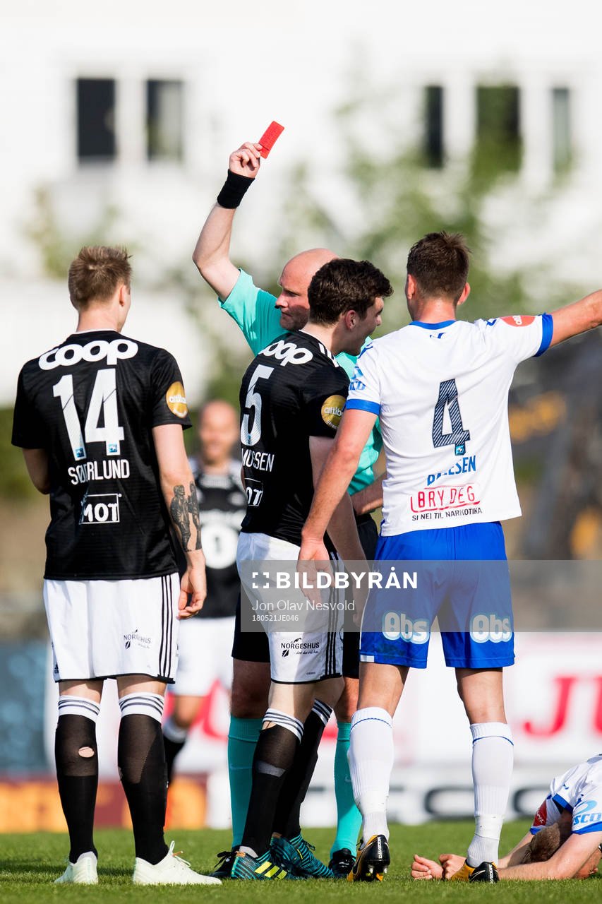 Jacob Rasmussen of Rosenborg is shown a red card by Trond
