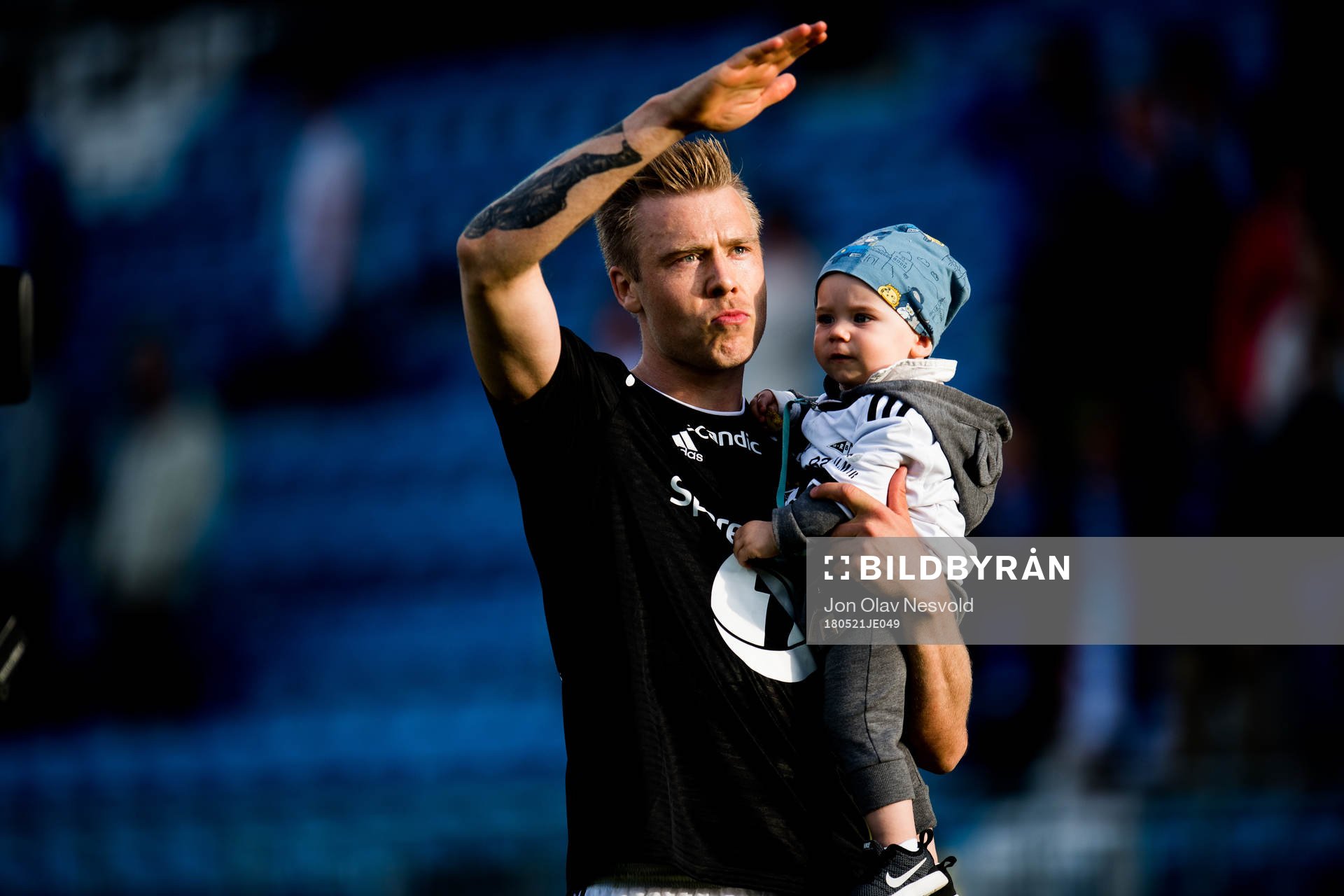 Alexander Søderlund of Rosenborg celebrates with his son